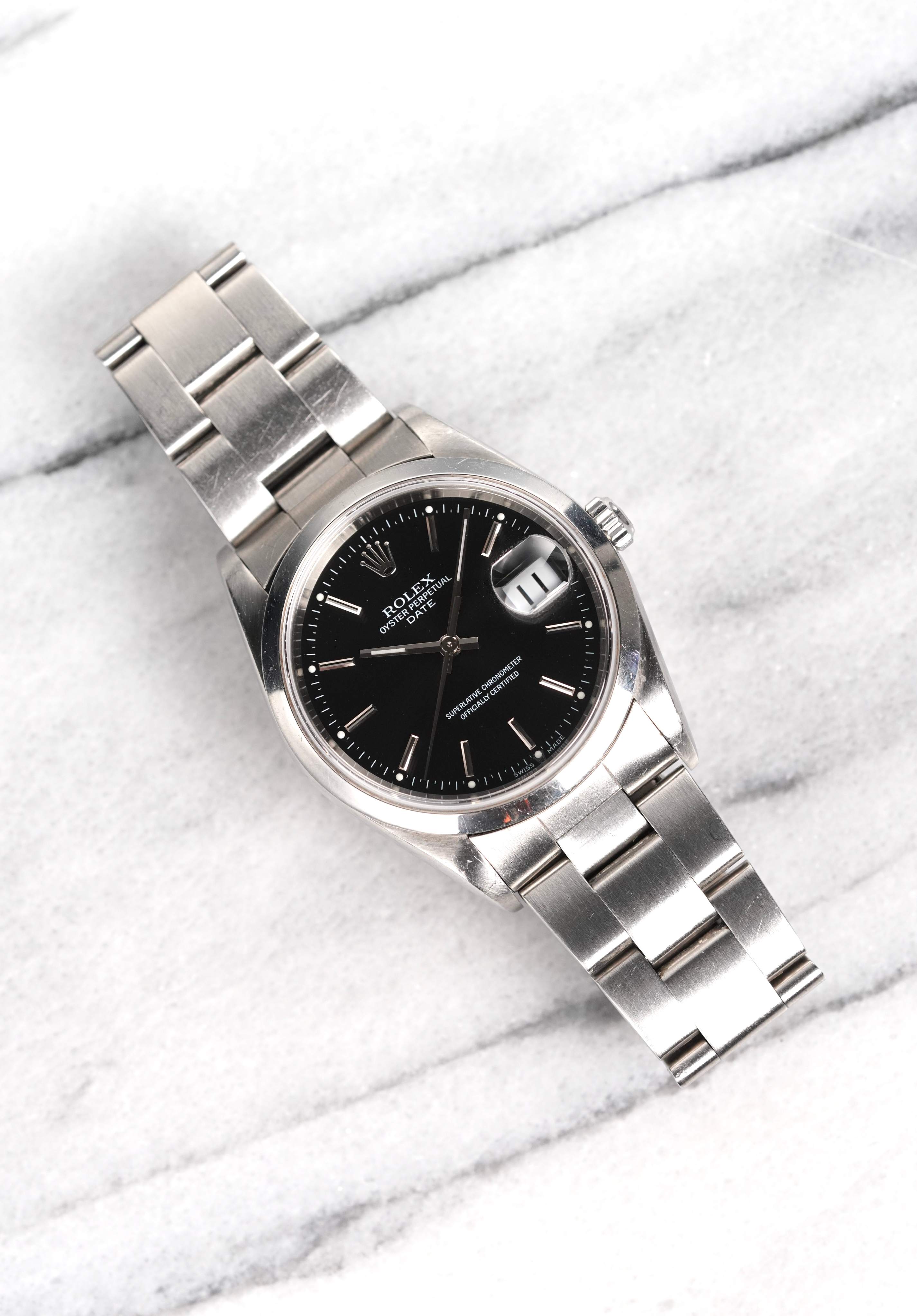 Rolex OP 15200 - Black Dial.