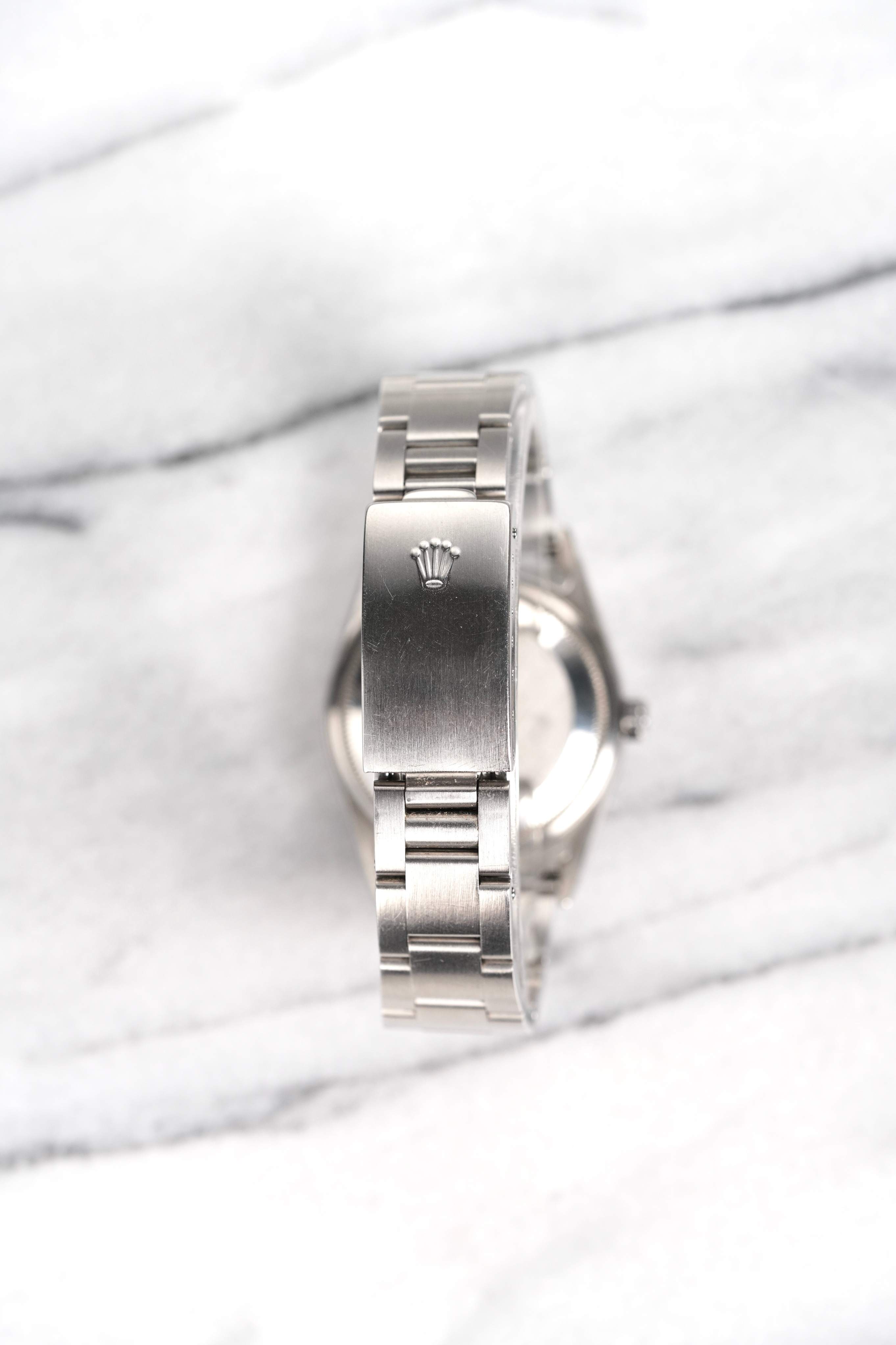 Rolex OP 15200 - Black Dial.