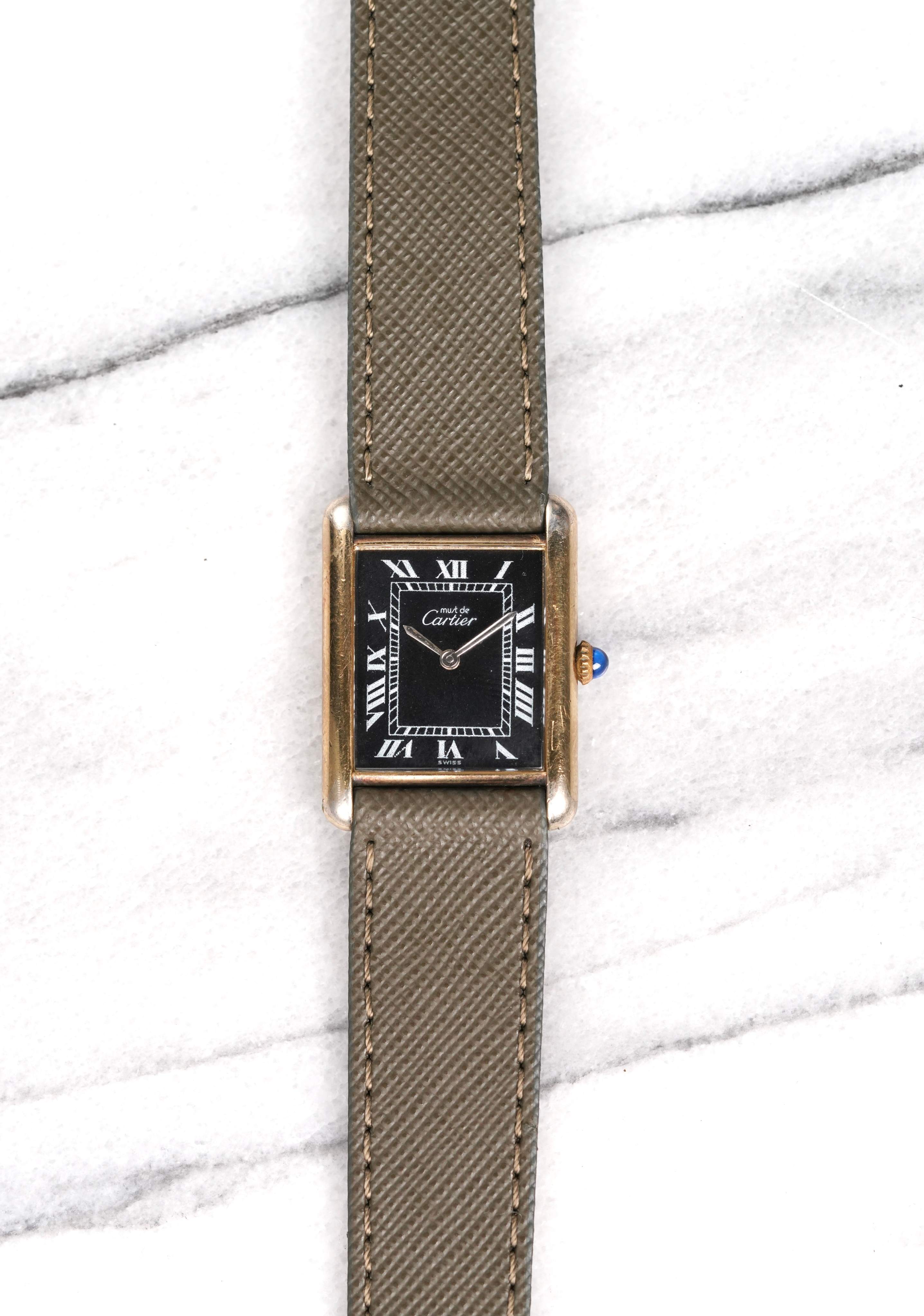 Cartier Tank - Black Roman Dial.
