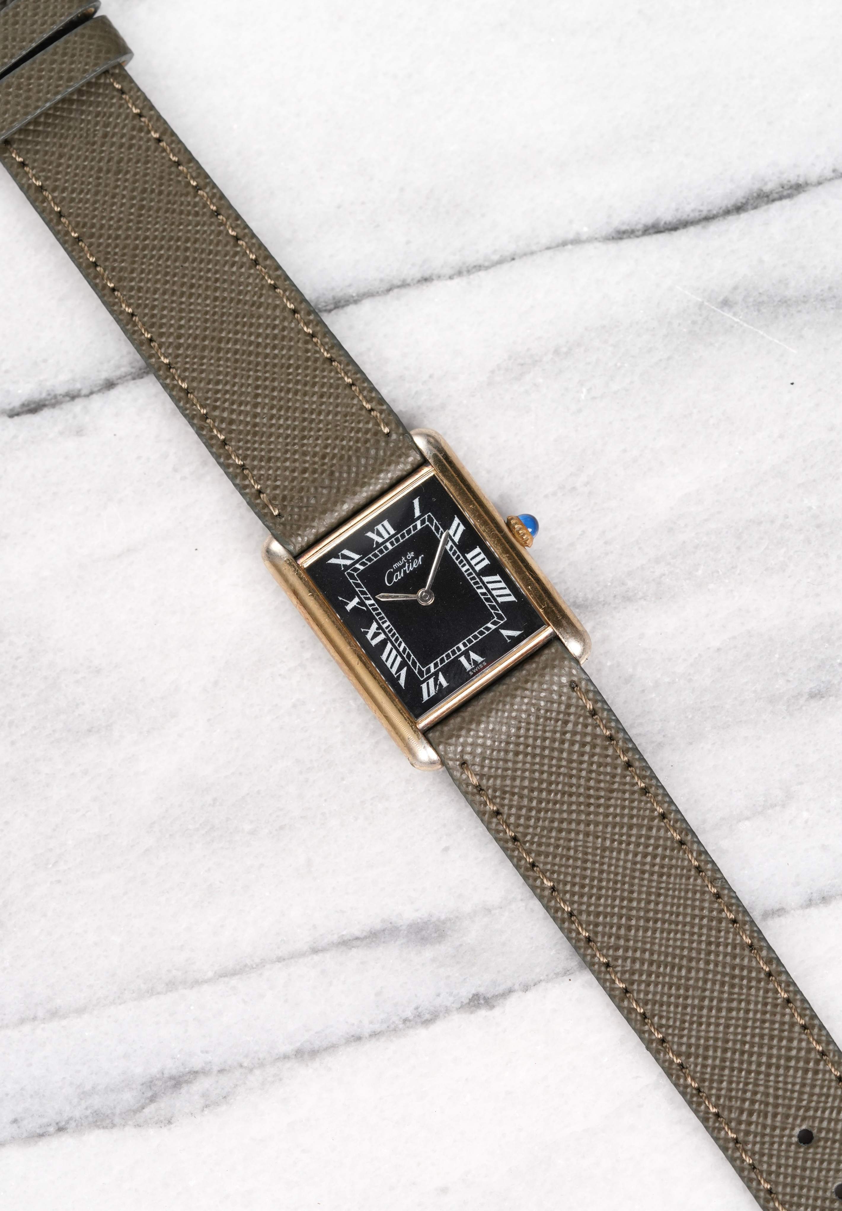 Cartier Tank - Black Roman Dial.