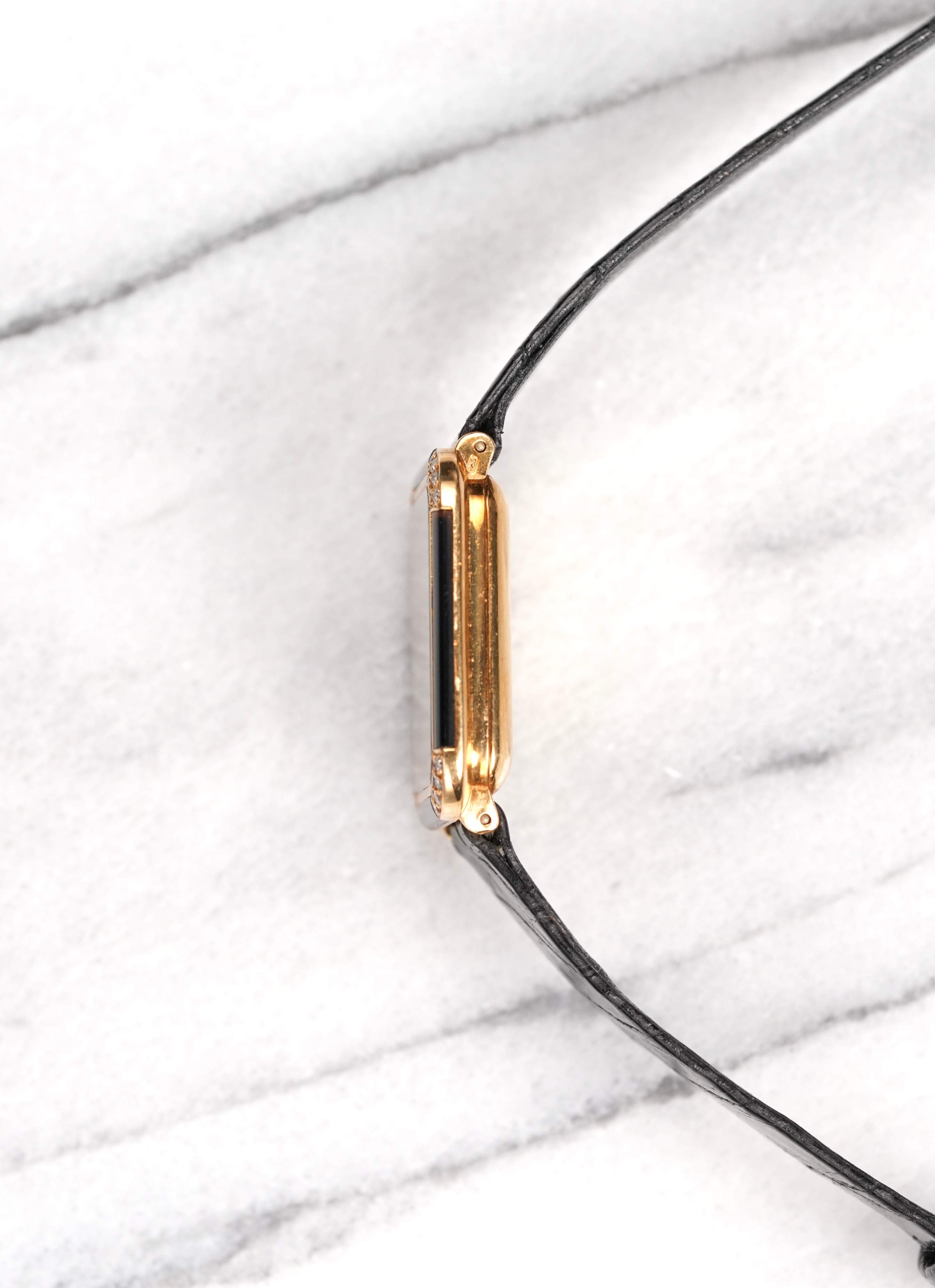 Corum Onyx Tank - 18K Yellow Gold