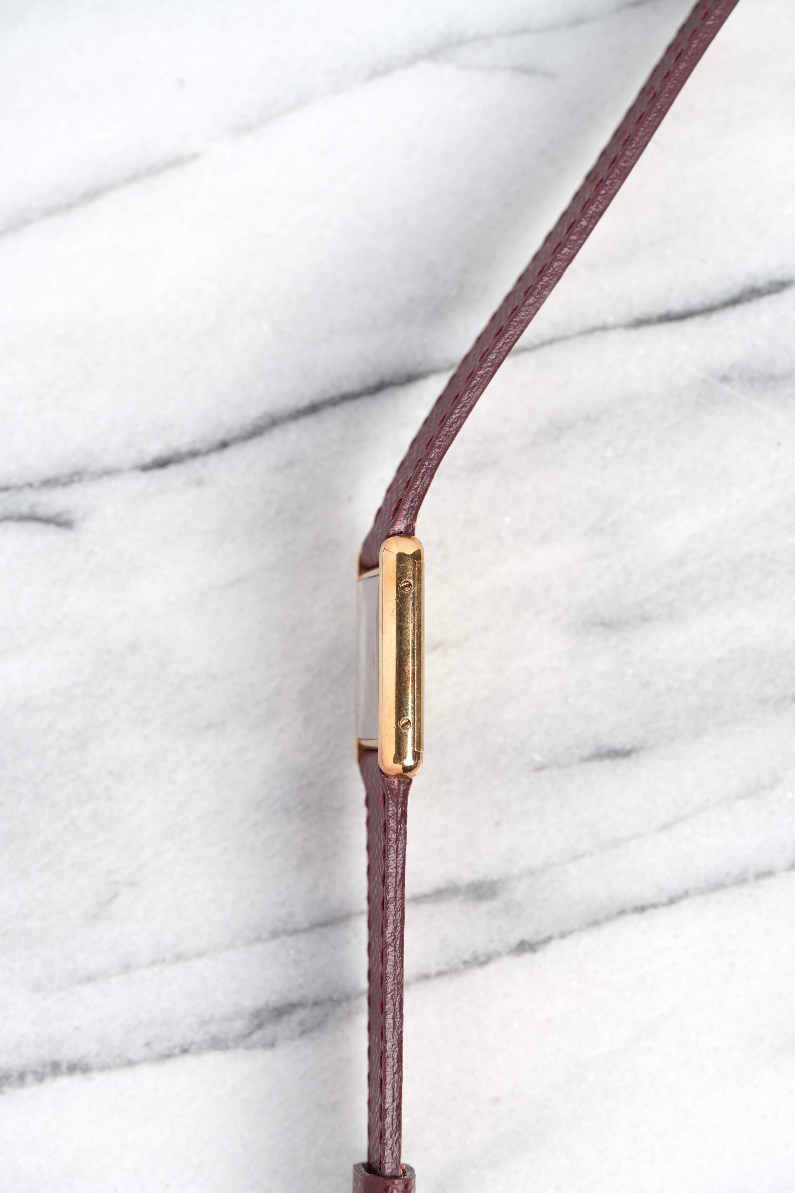 Cartier Tank - Red Dial.