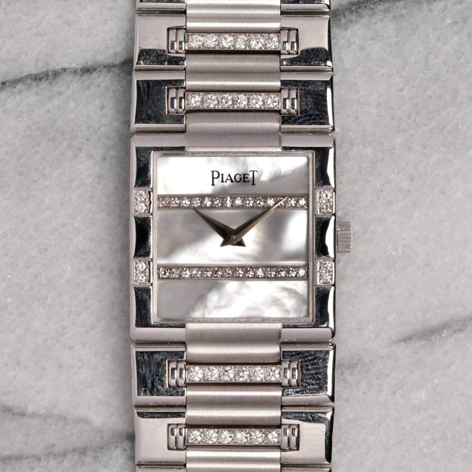 Piaget 18K White Gold - MOP & Diamond Dial.