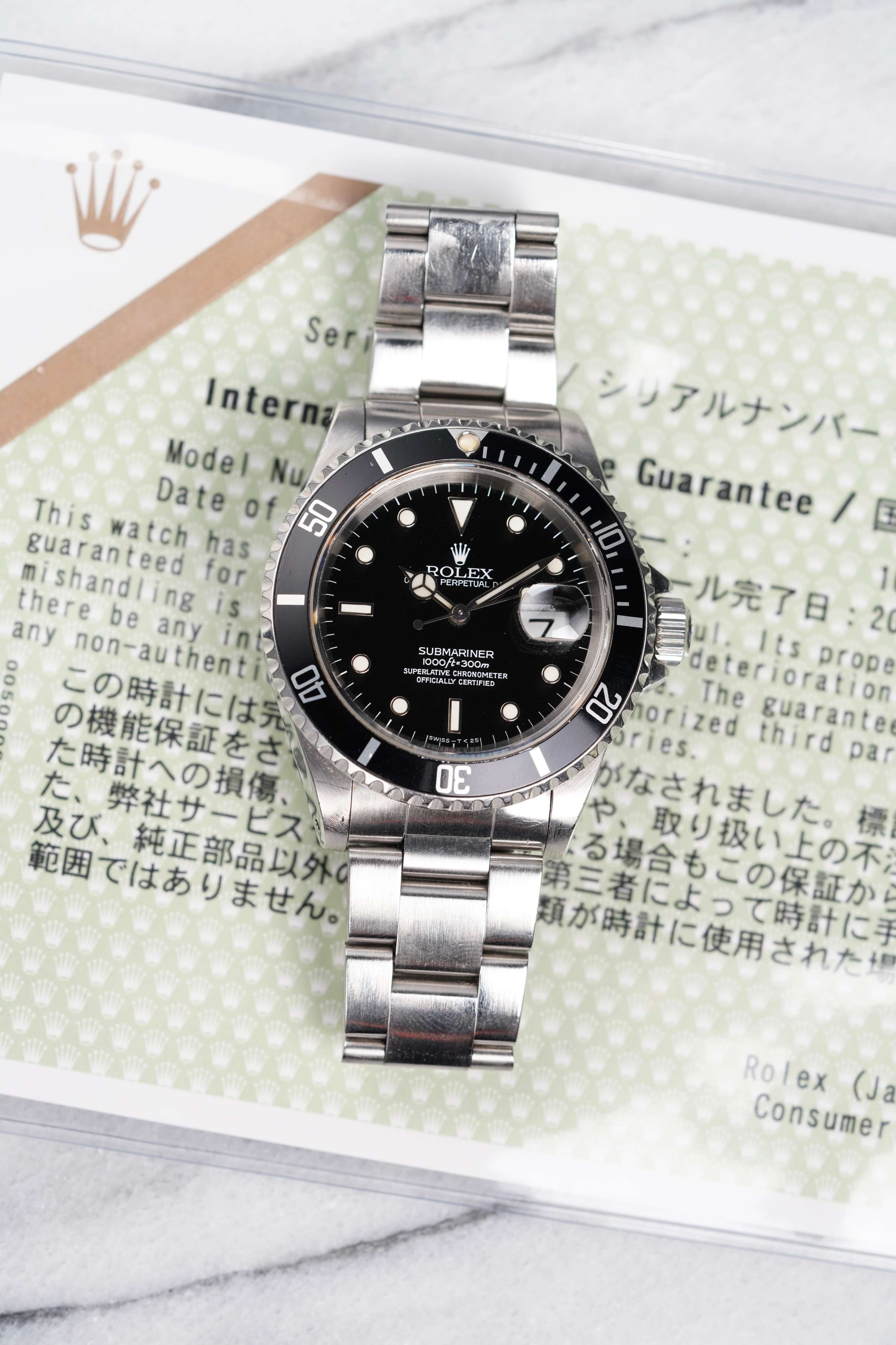 Rolex Submariner 16610 - Service Papers