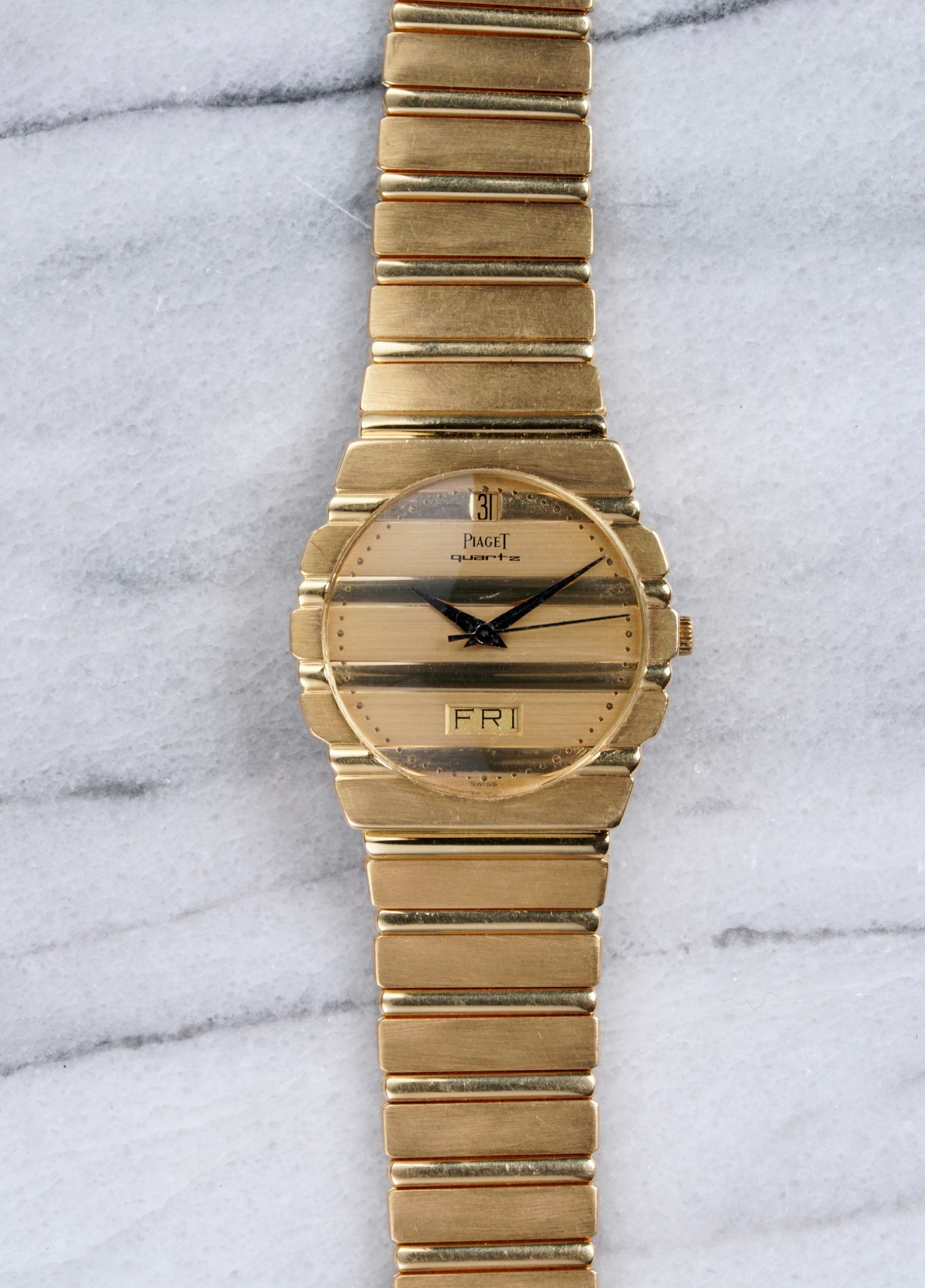 Piaget Polo - 18K Yellow Gold.