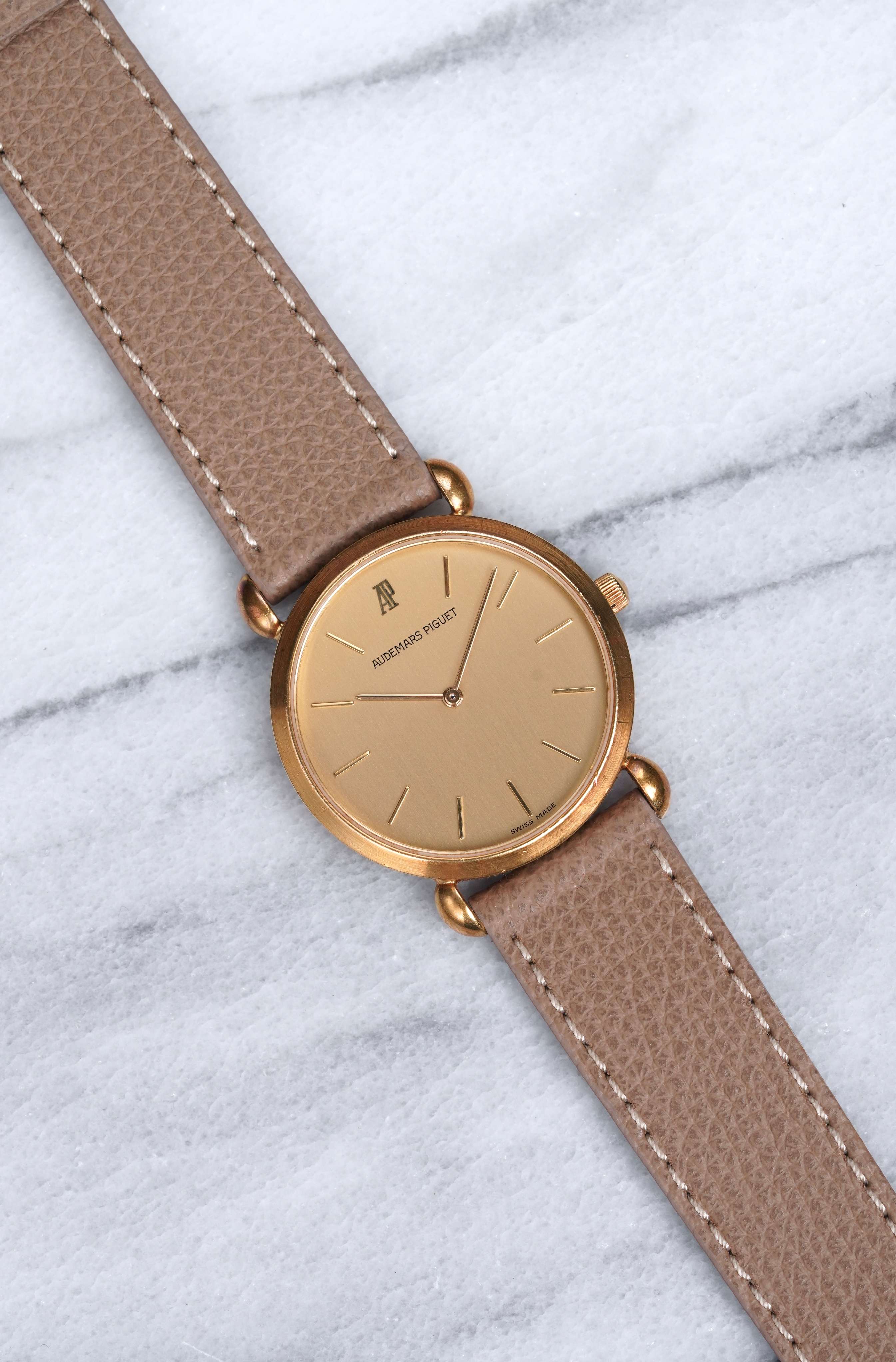 Audemars Piguet - 18K Yellow Gold.