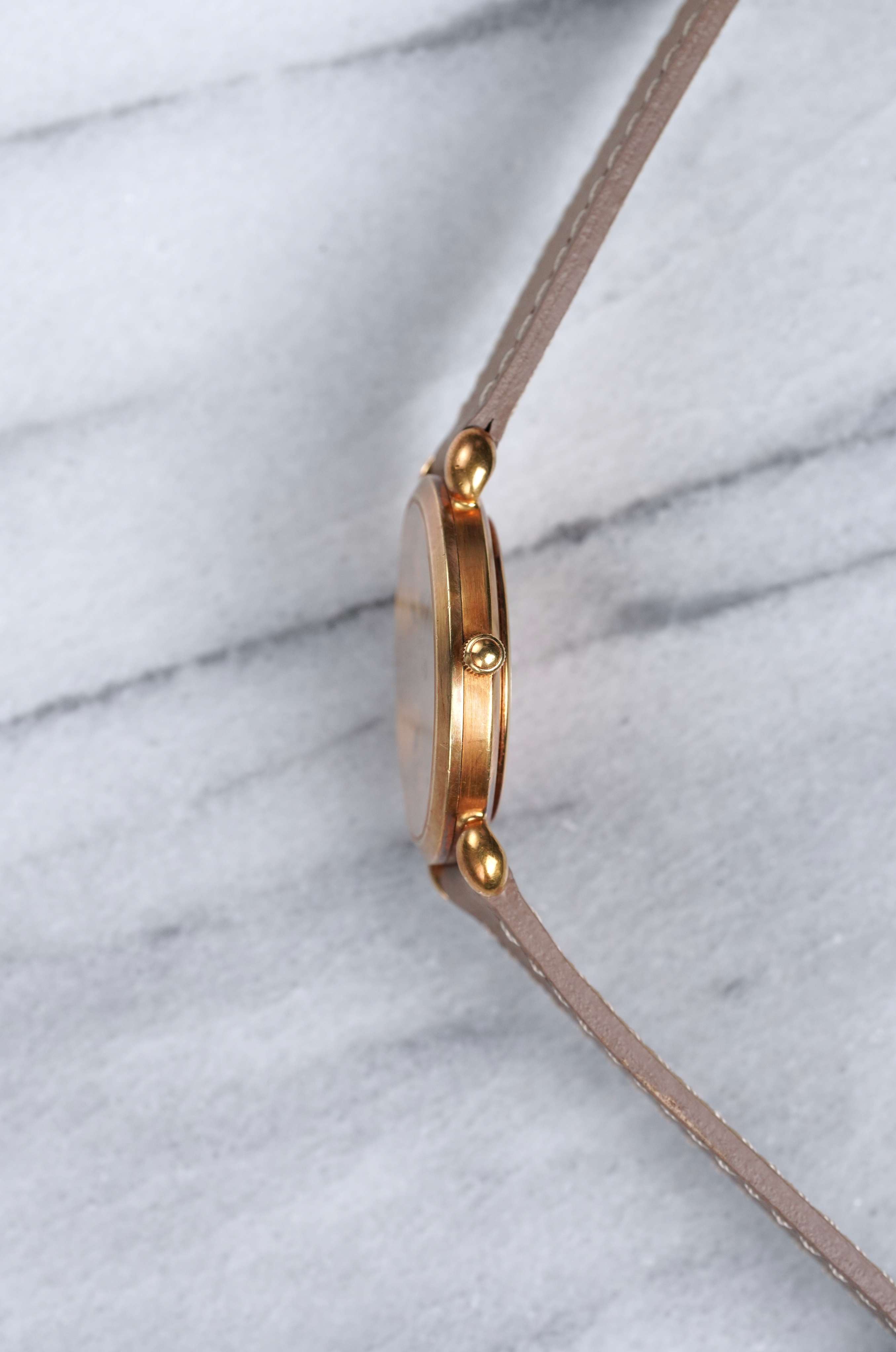 Audemars Piguet - 18K Yellow Gold.