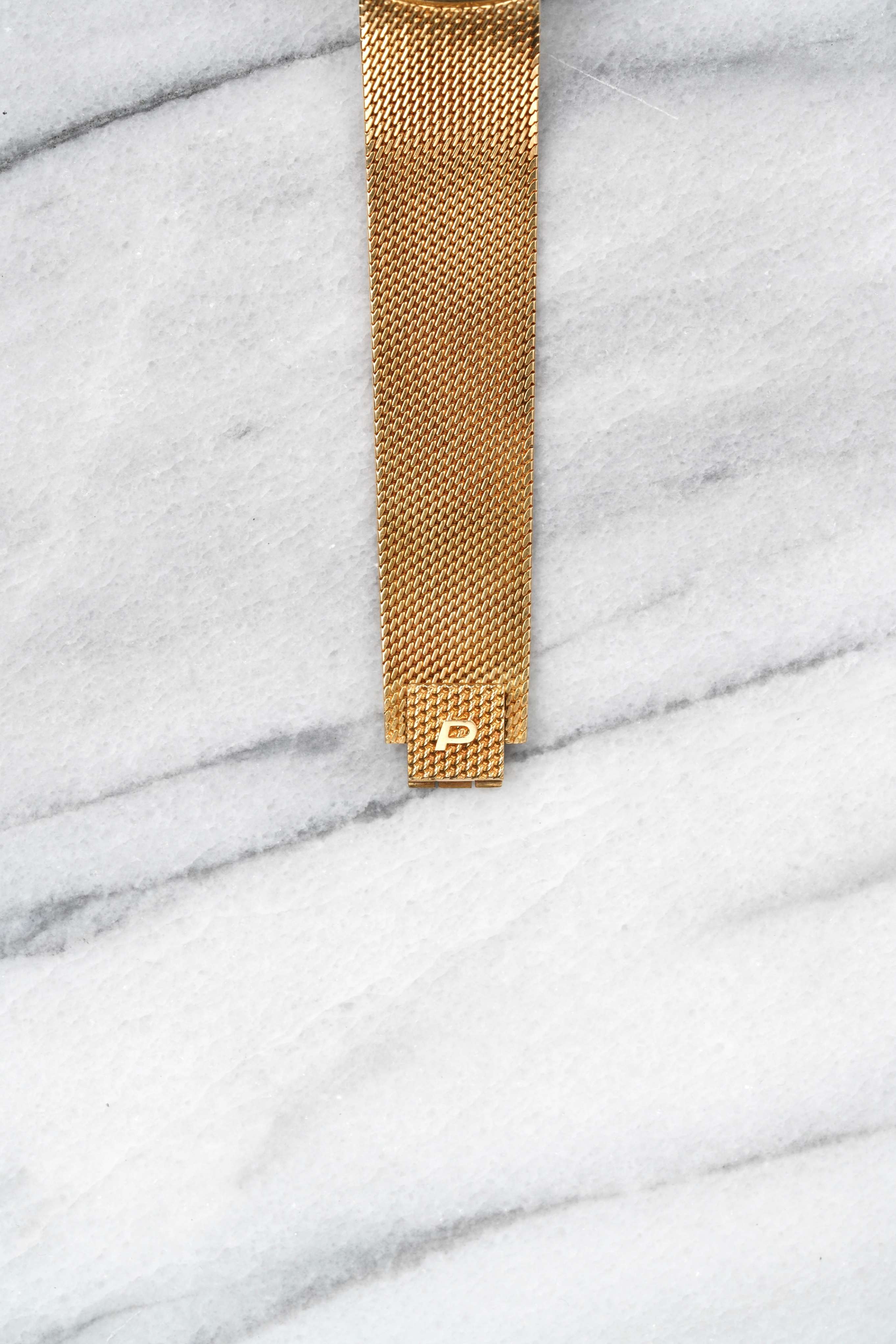 Piaget Tiger Eye - 18K Yellow Gold.