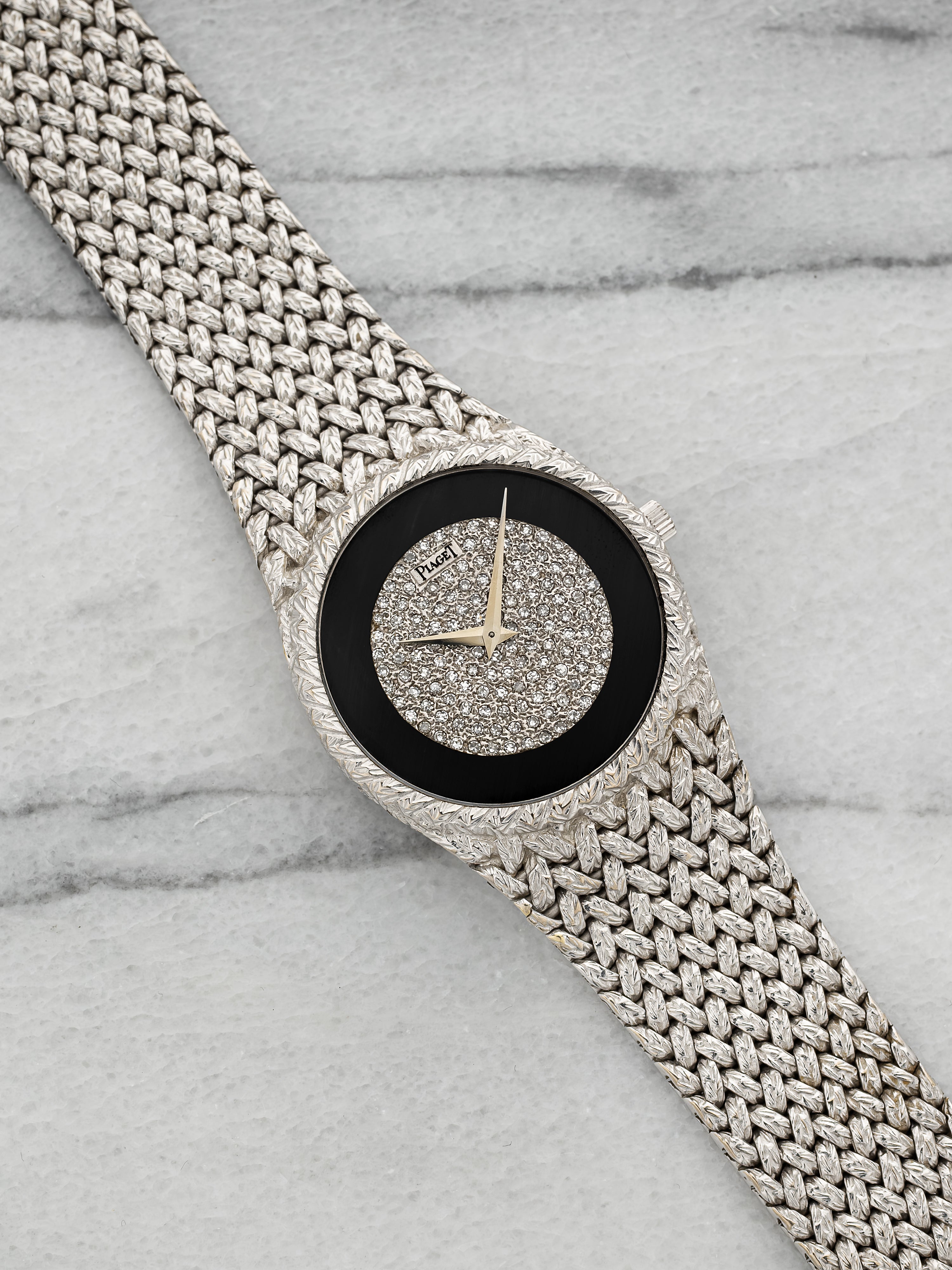 Piaget 9362D2 – White Gold Integrated Onyx & Pavé Dial