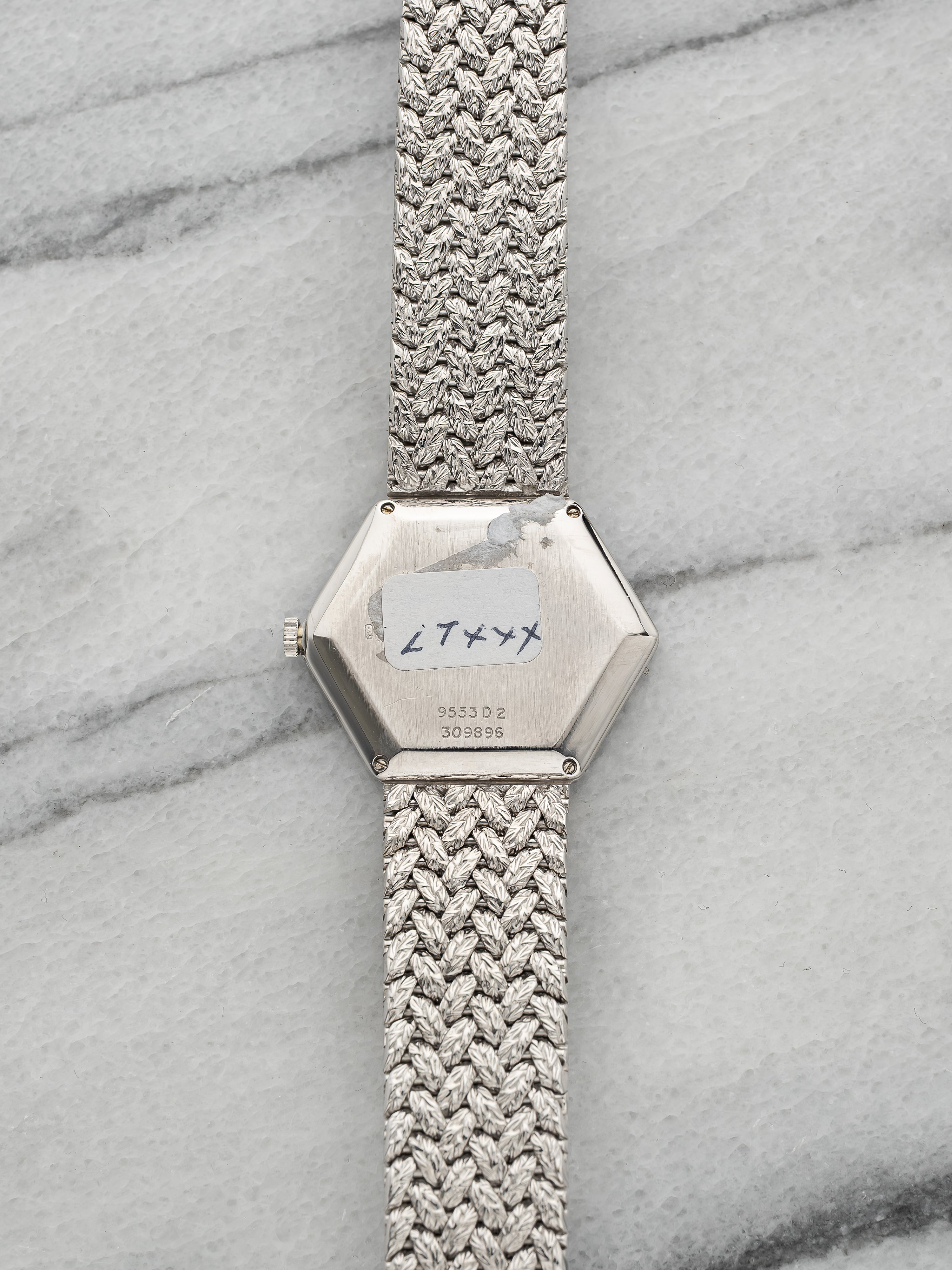 Piaget Hexagonal – White Gold Pavé Dial with Turquoise & Lapis Bezel