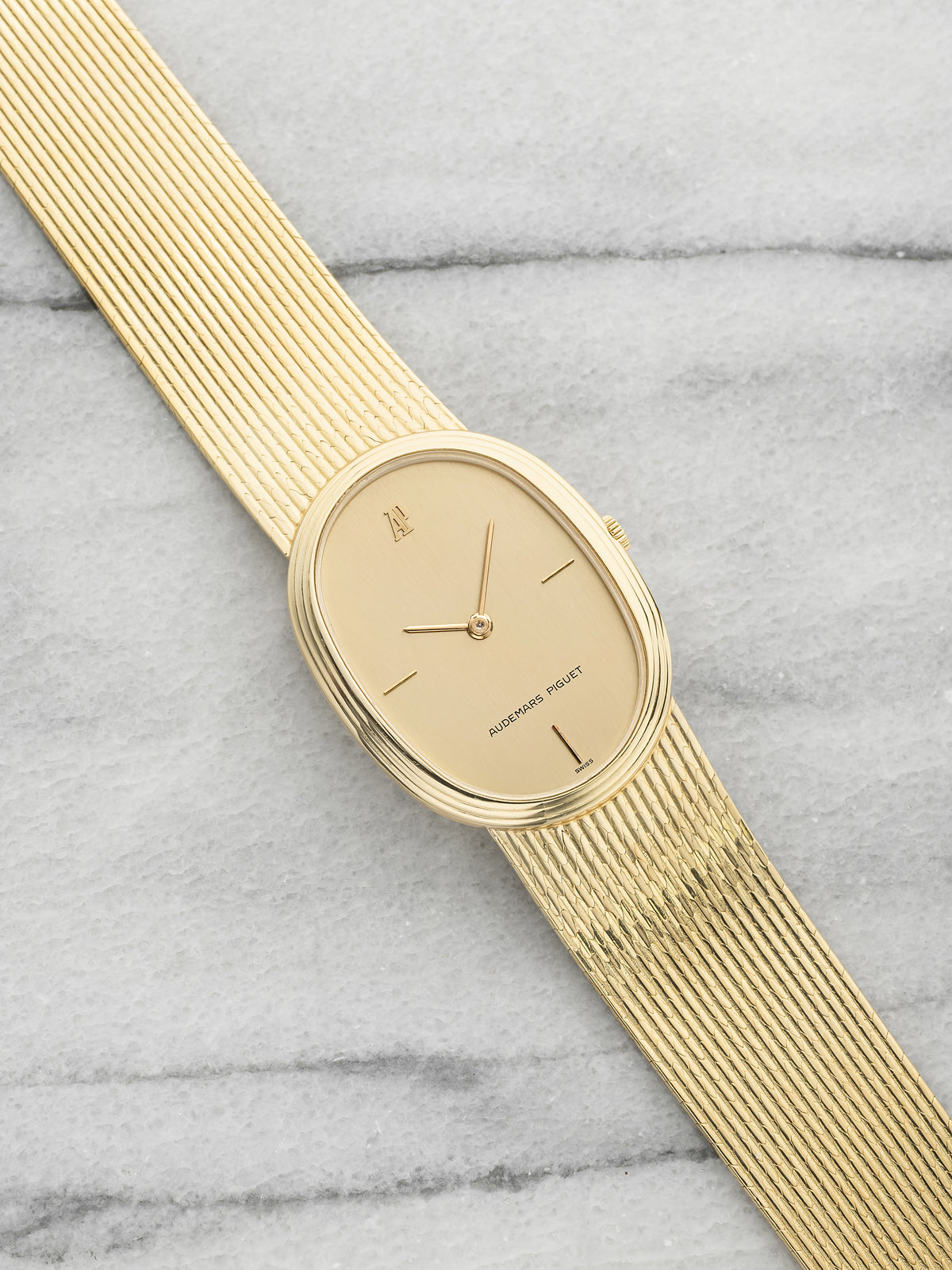 Vintage 1970s Audemars Piguet Ellipse 18K Yellow Gold Champagne Dial Manual 26mm