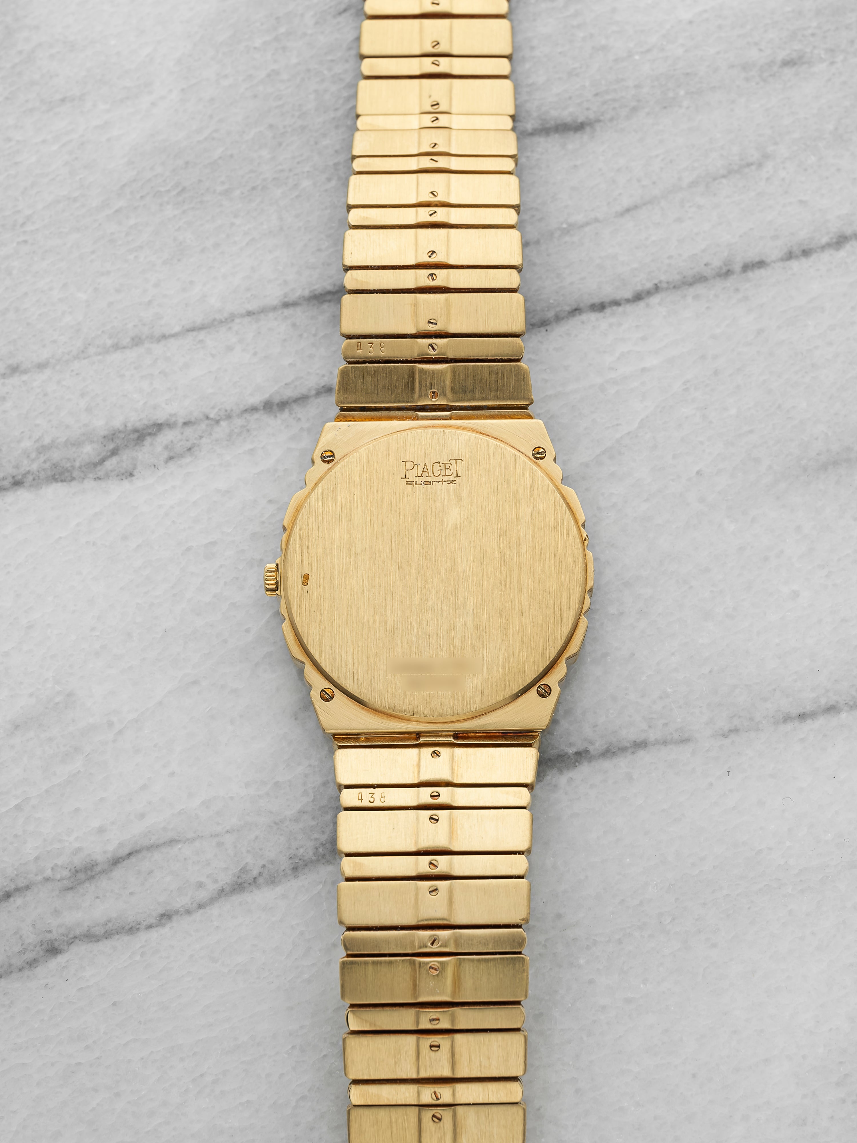 Vintage 1980s Piaget Polo 15562 C701 18K Yellow Gold Champagne Dial Quartz 31mm