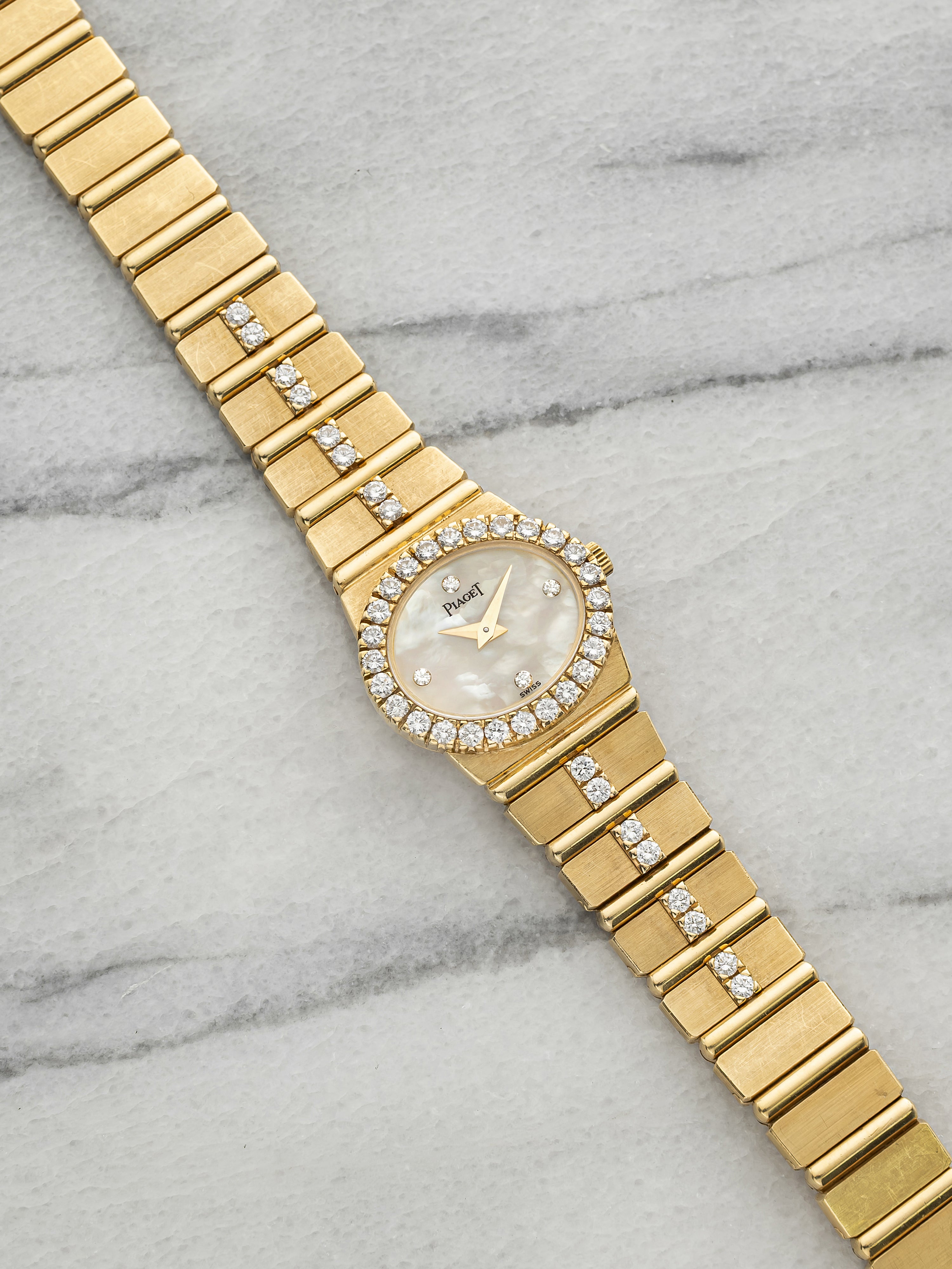Vintage 1970s Piaget Lady Polo 8306 C702 18K YG MoP Diamond Dial Quartz 22mm