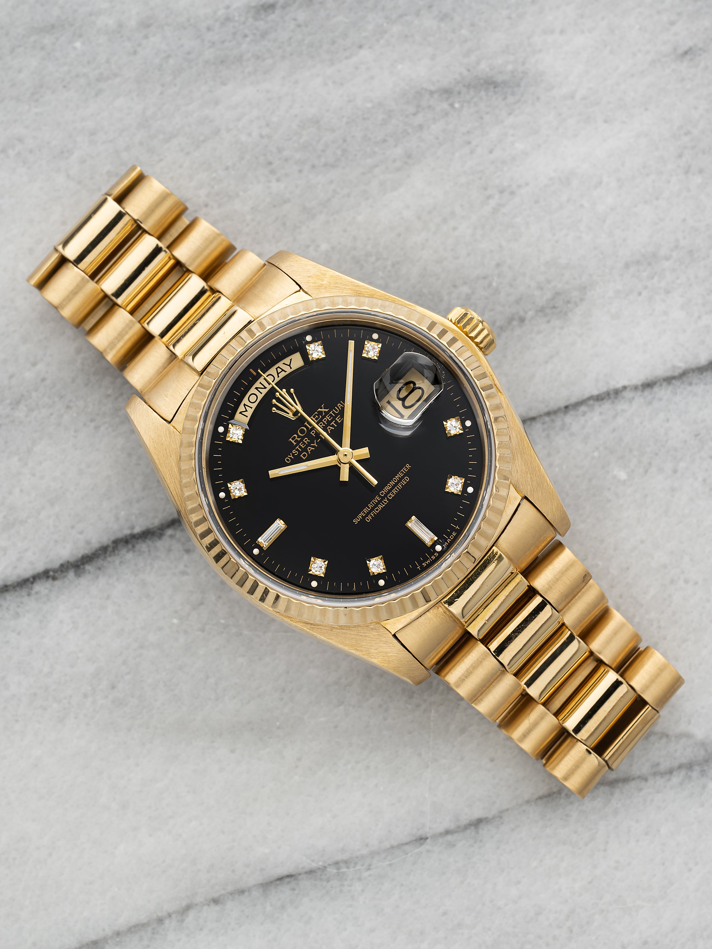 1985 Rolex Day-Date 18038 - Yellow Gold Black Diamond Dial