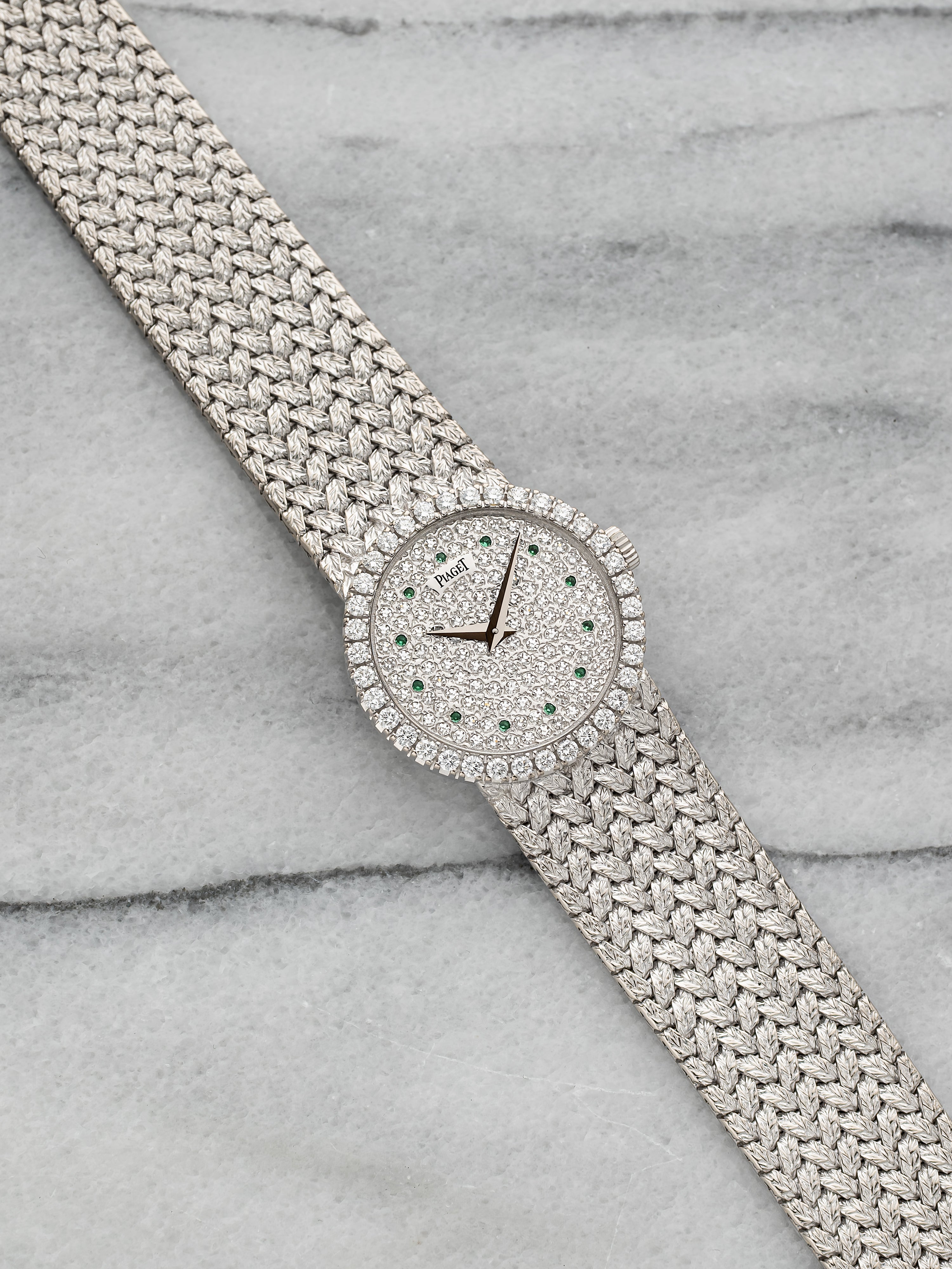 Piaget 9706 - Integrated White Gold Pave Emerald Dial