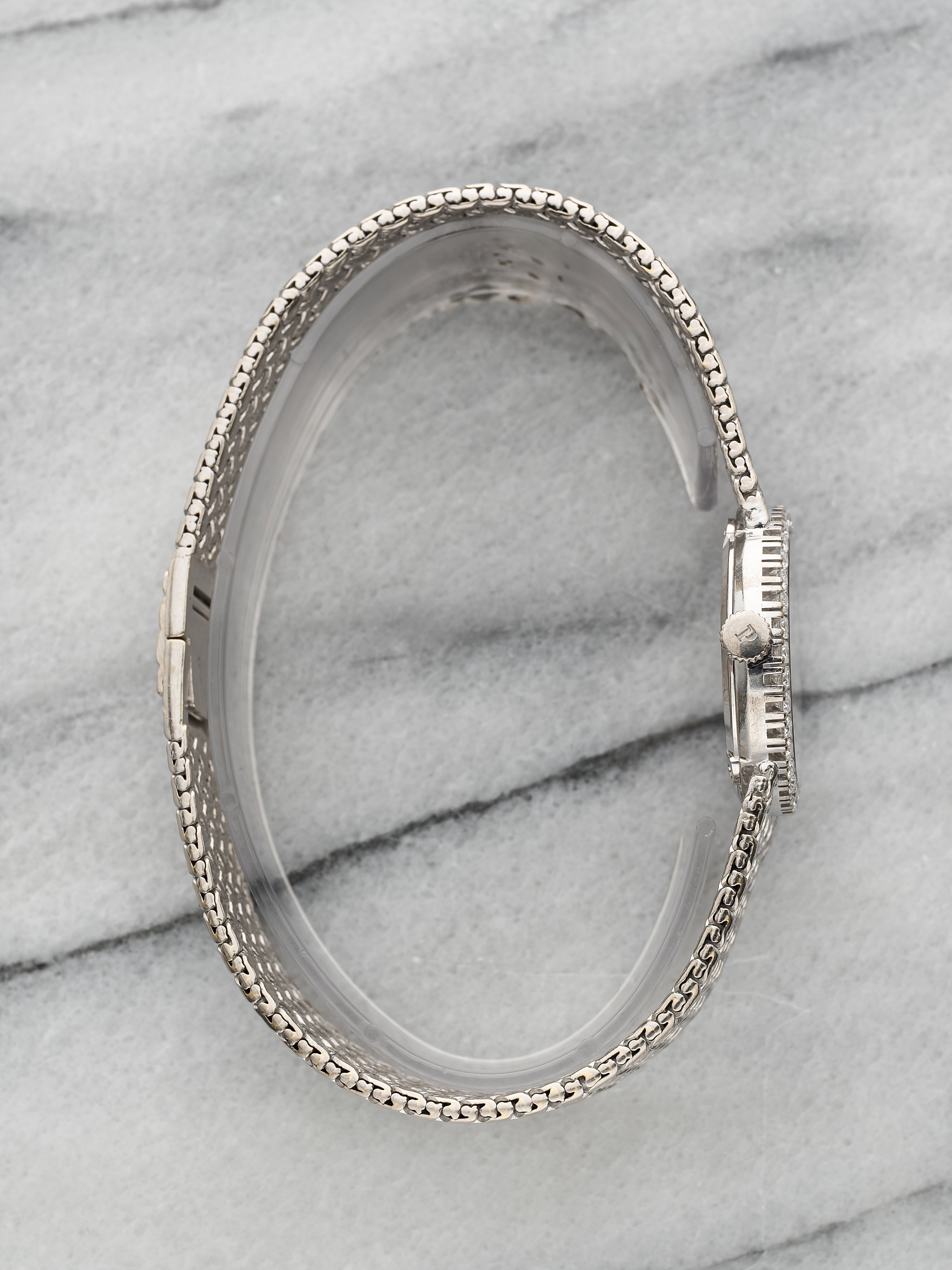 Piaget 9706 - Integrated White Gold Pave Emerald Dial