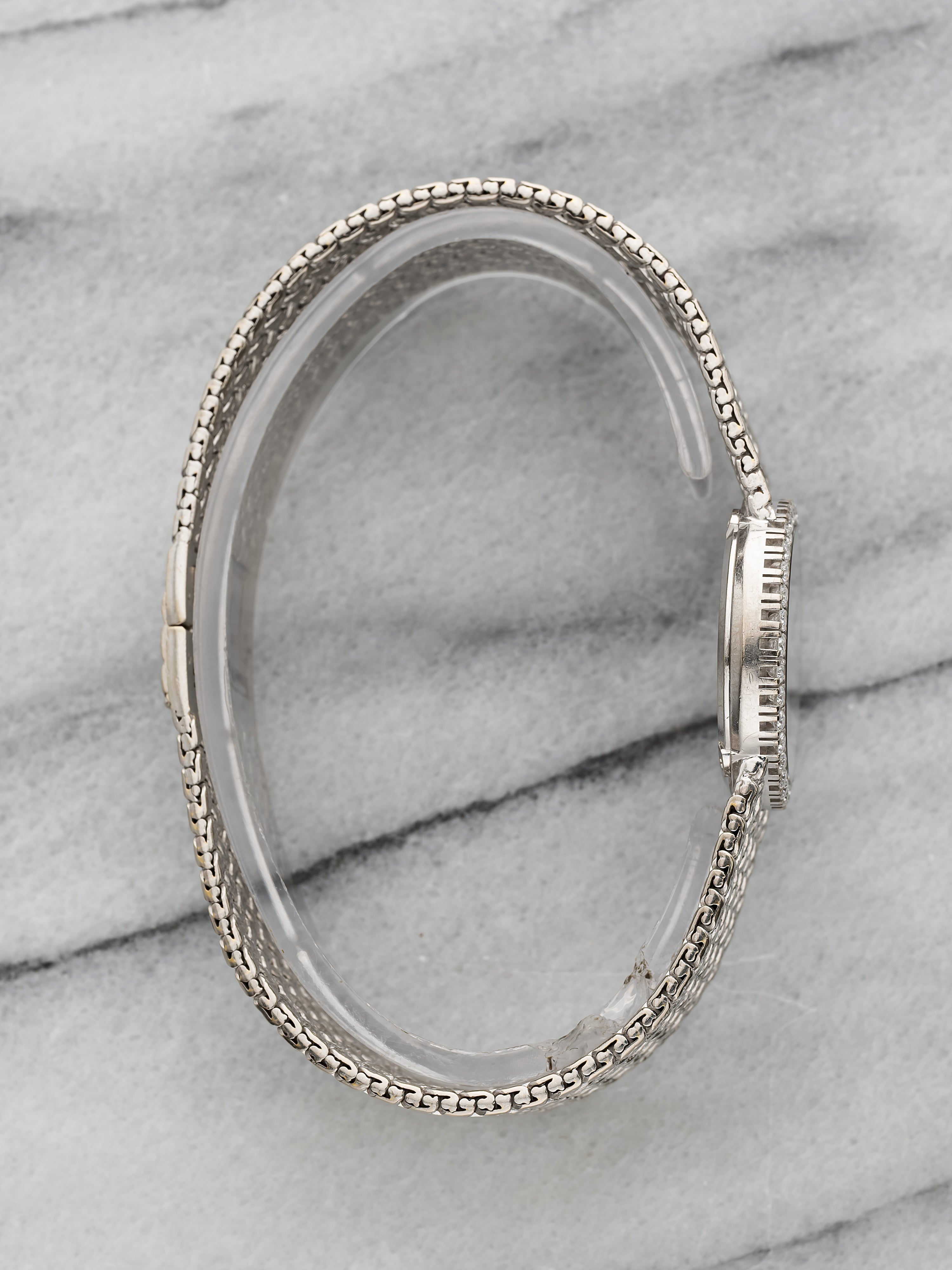 Piaget 9706 - Integrated White Gold Pave Emerald Dial