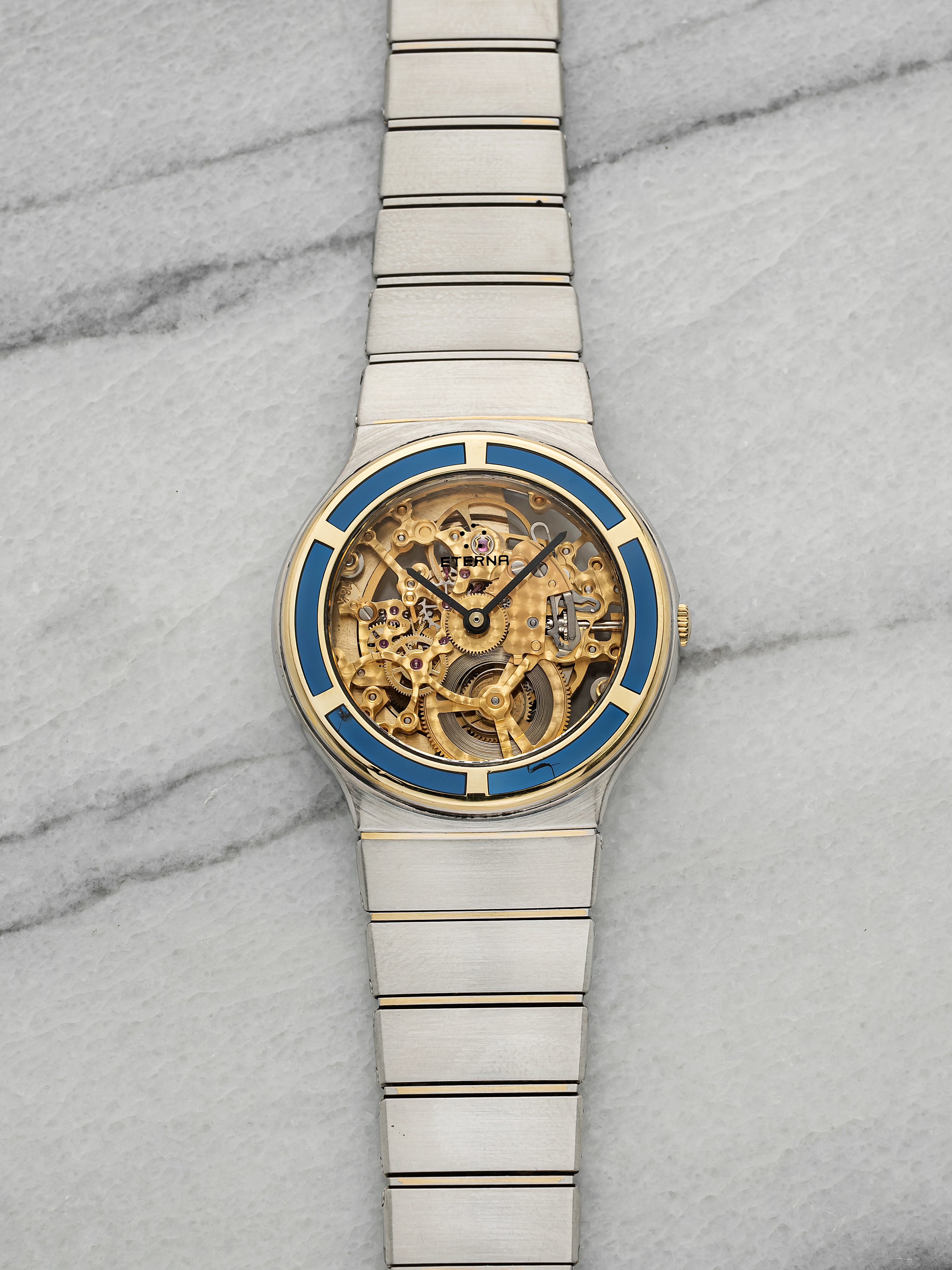 Vintage 1990s Eterna Gold Club Two Tone Sapphire Bezel Skeleton Dial Auto 34mm