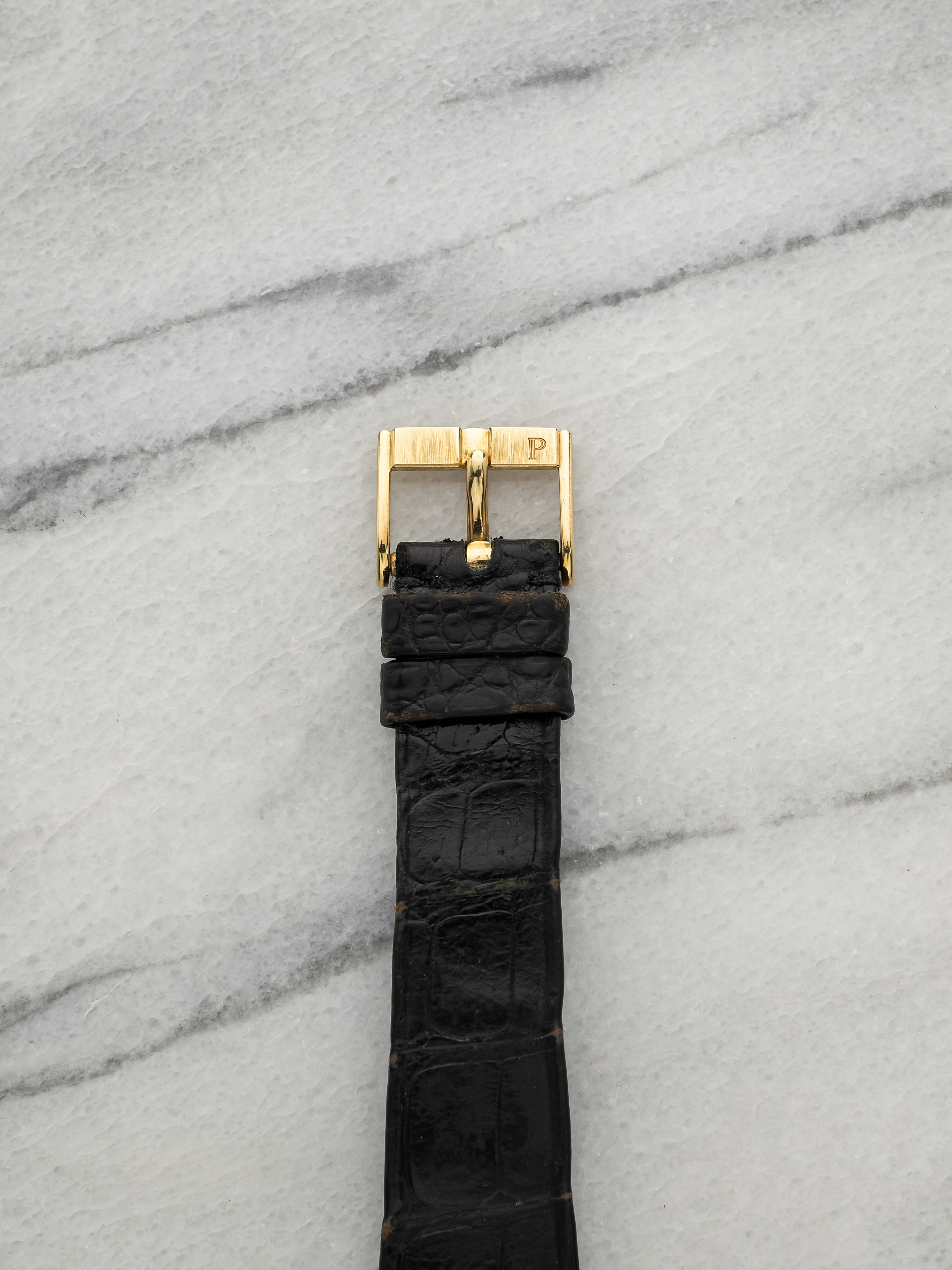 Vintage 1980s Piaget Polo 8673 18K Yellow Gold Champagne Dial Quartz 31mm