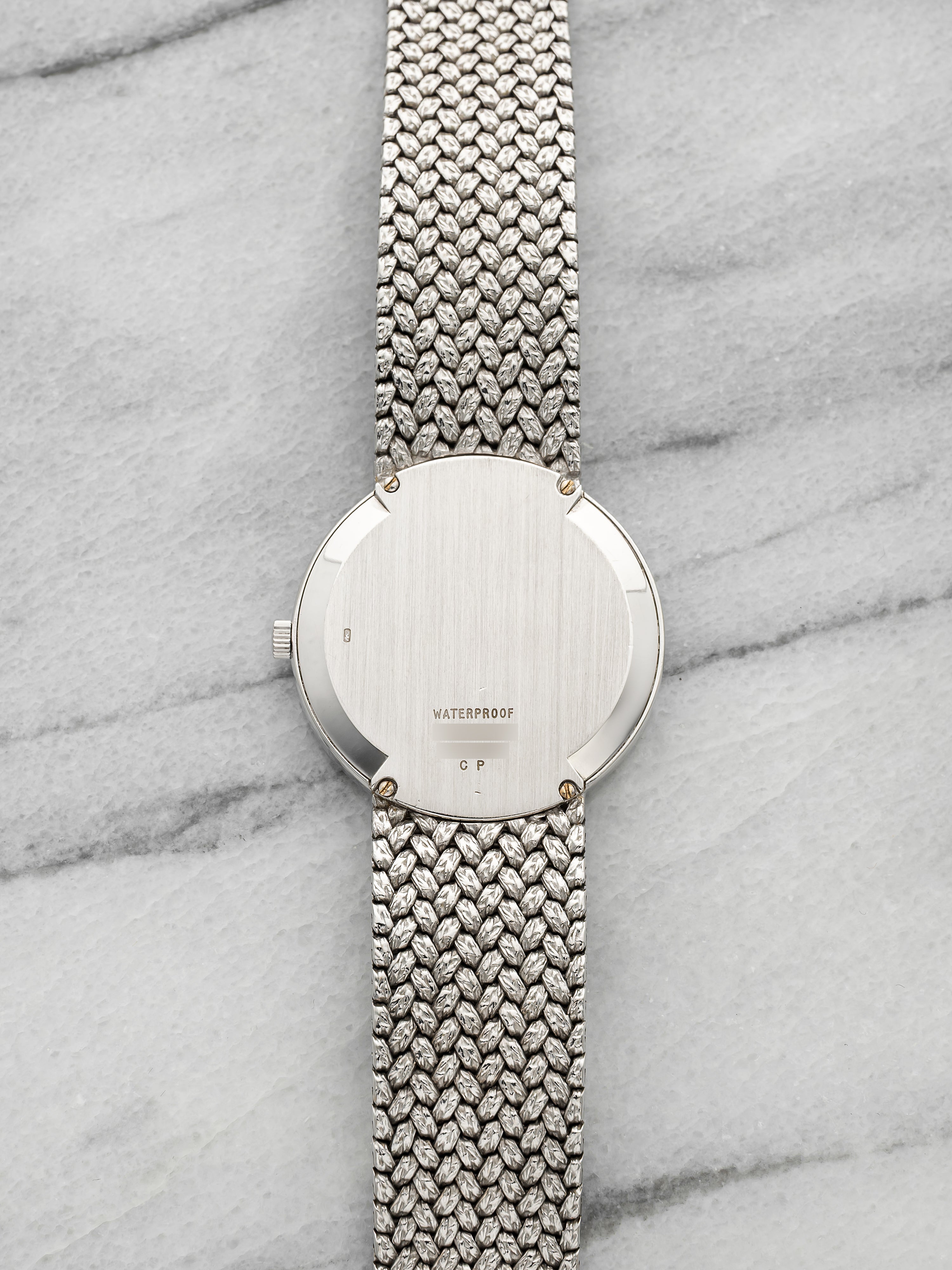 Vintage 1980s Piaget 12343D2 18K White Gold Hawkeye Diamond Dial Auto 34mm