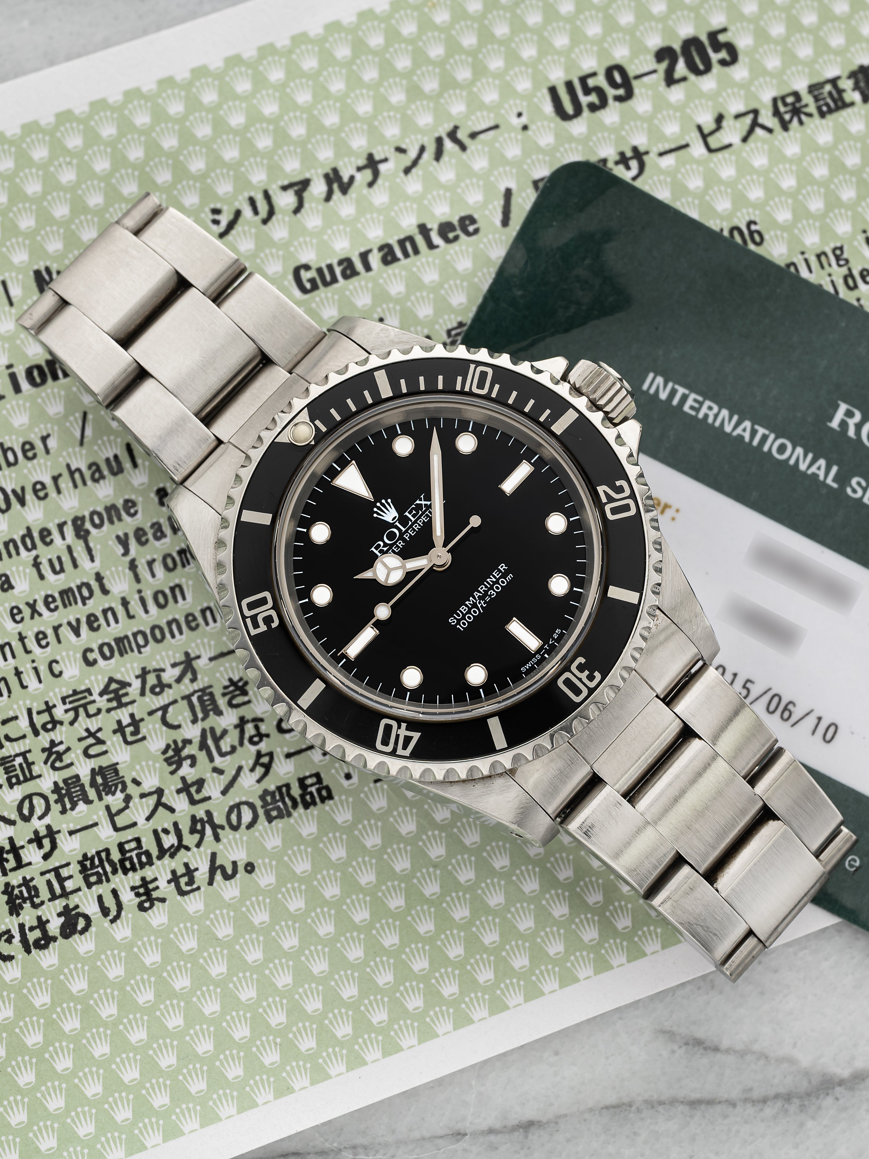 1997 Rolex Submariner 14060 – Stainless Steel Black "Two-Liner"