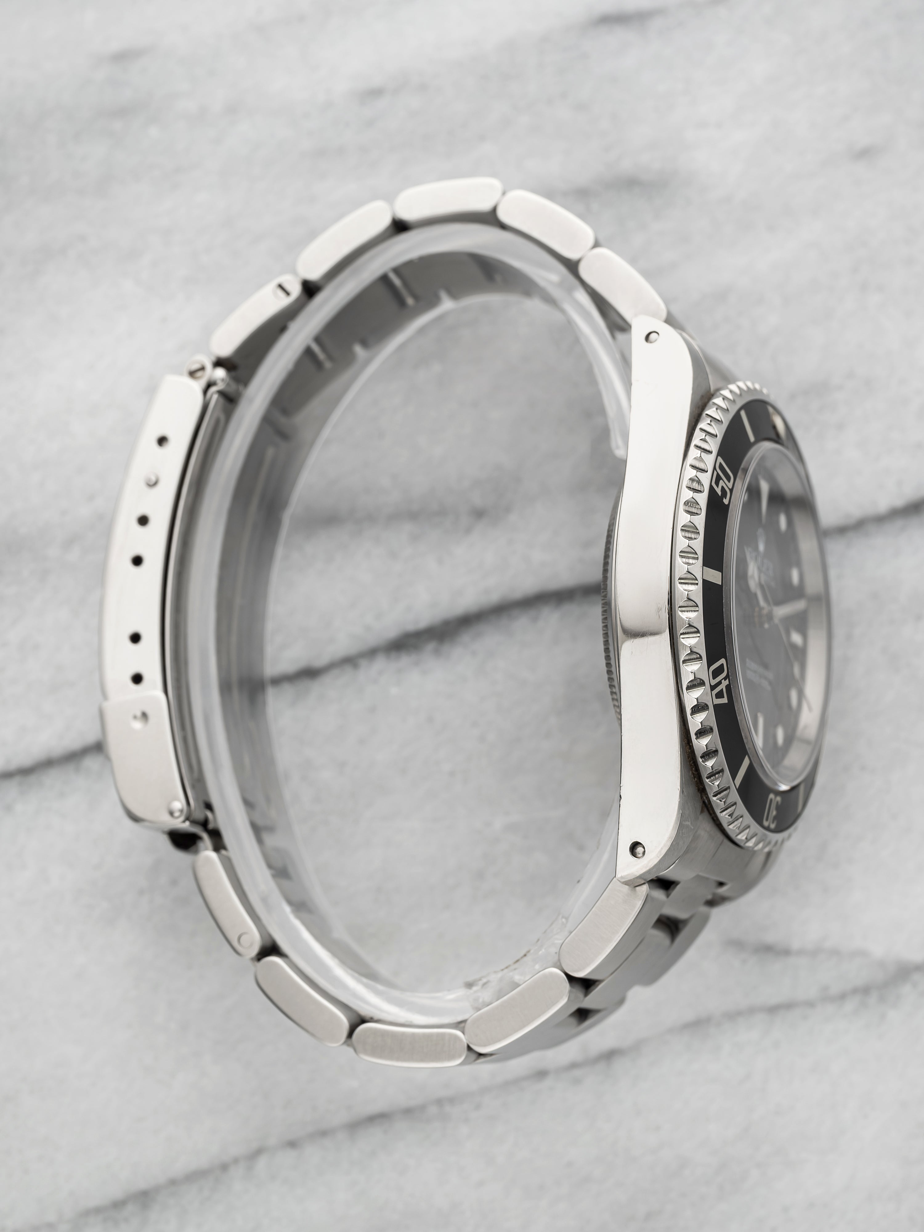 1997 Rolex Submariner 14060 – Stainless Steel Black "Two-Liner"