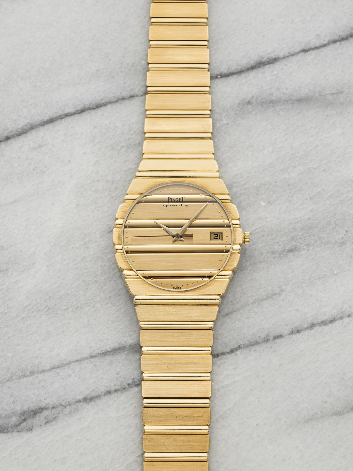 Vintage 1980s Piaget Polo 15661C701 18K YG Champagne Gadroon Dial Quartz 34mm