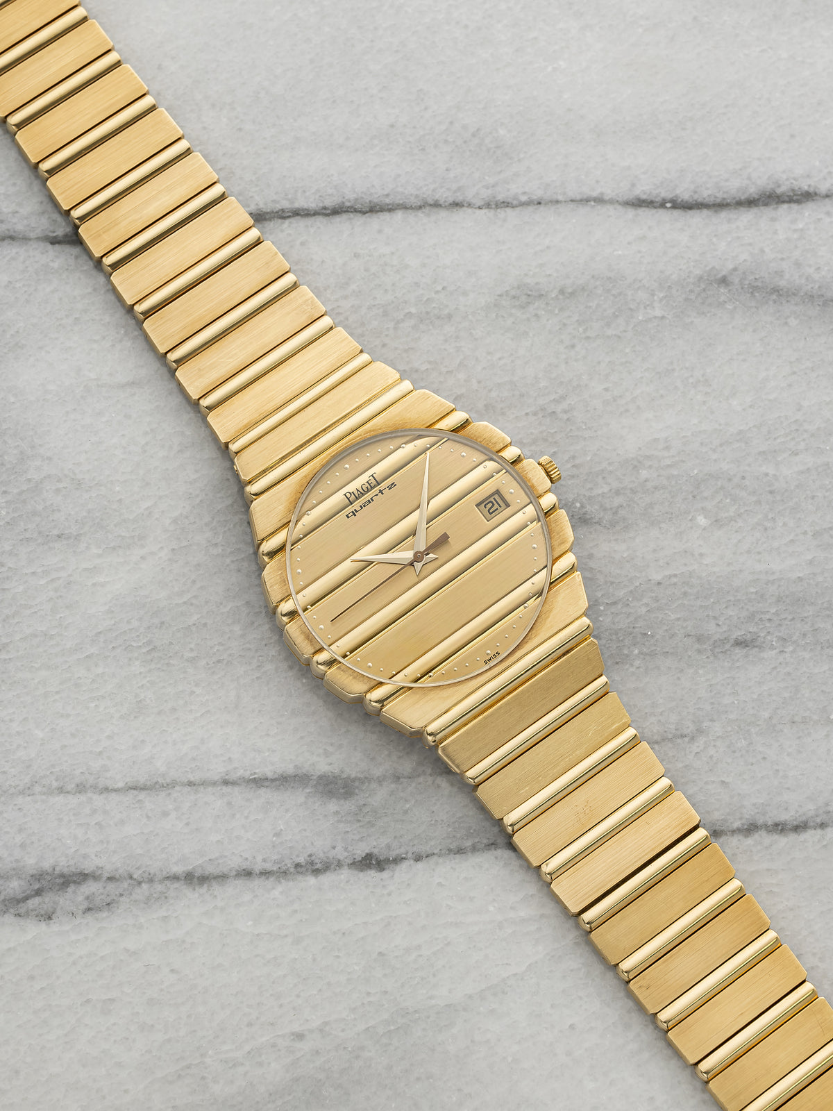 Vintage 1980s Piaget Polo 15661C701 18K YG Champagne Gadroon Dial Quartz 34mm