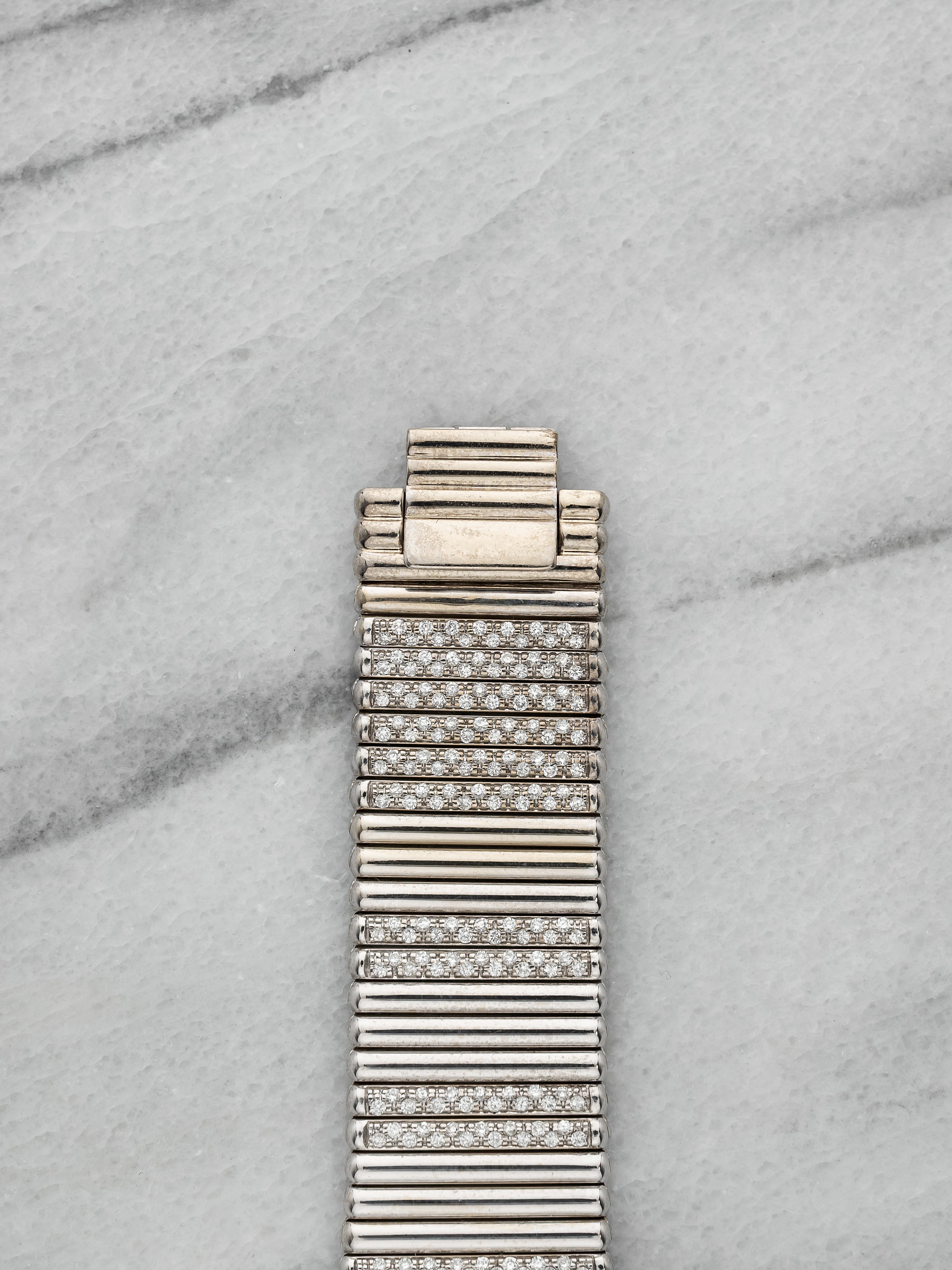 Piaget 12336 – 18K White Gold Diamond & Emerald Pave Dial