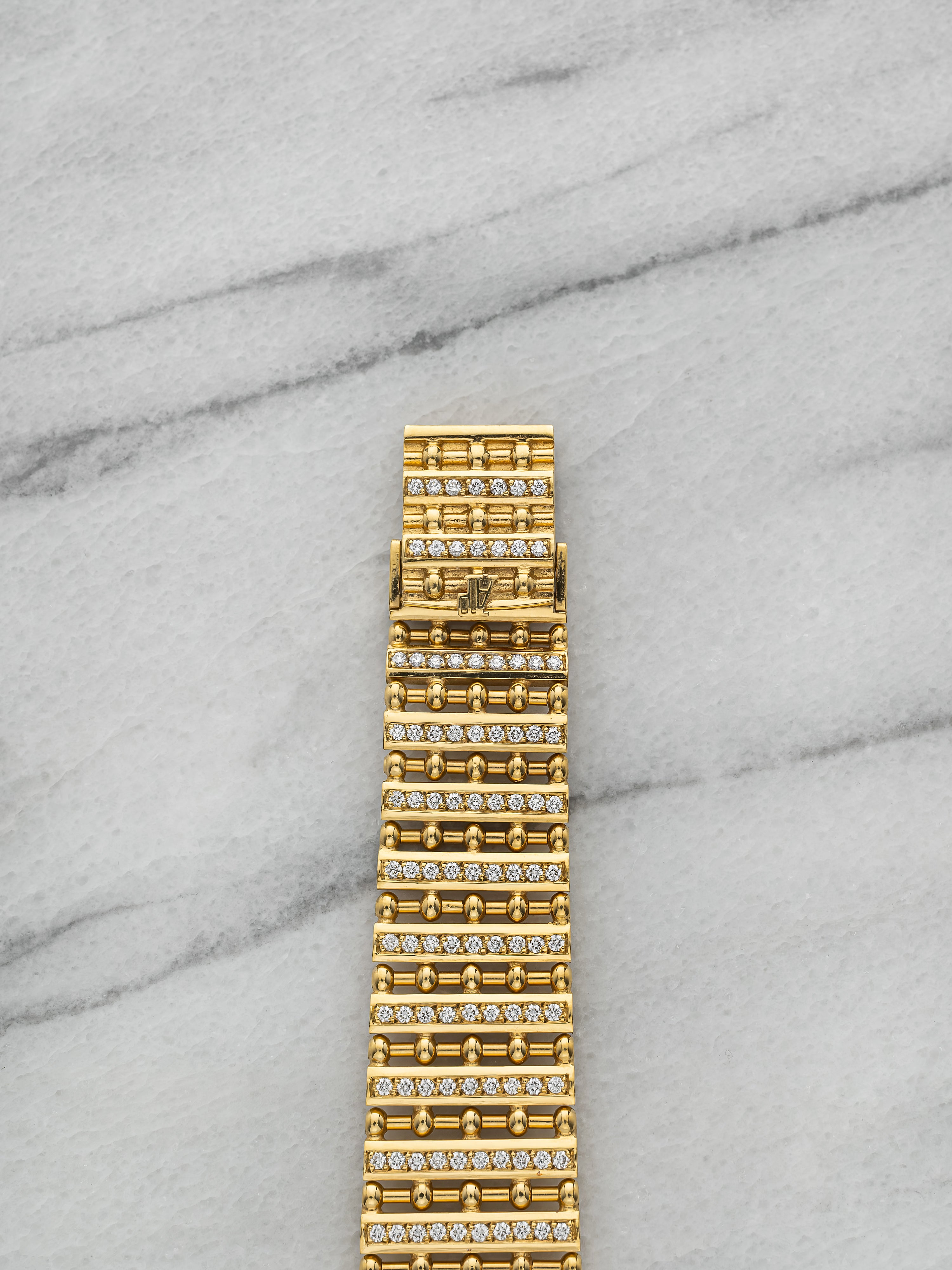 Audemars Piguet 56059BA – 18K Yellow Gold Diamond Bullet Bracelet