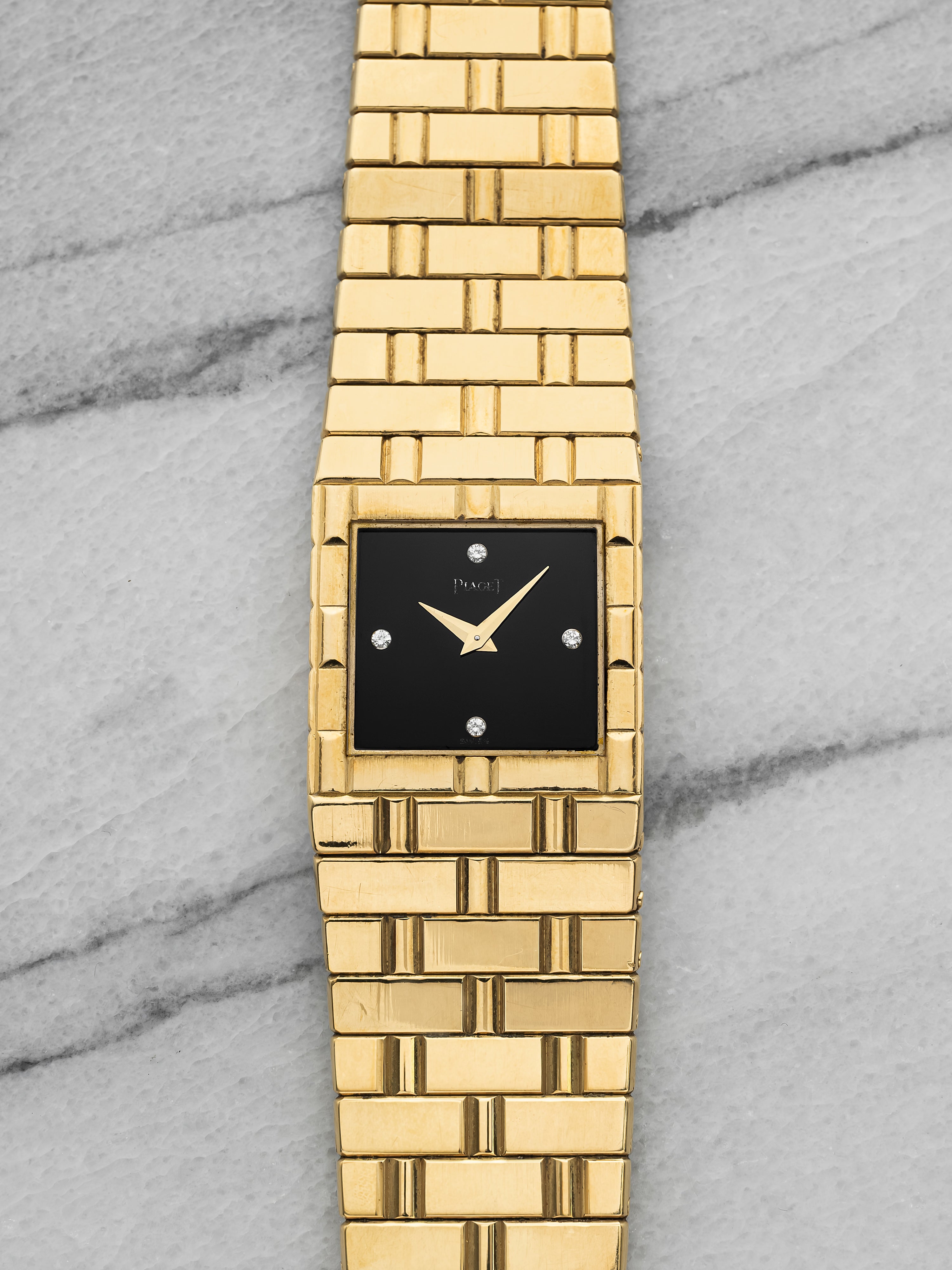 Piaget Polo 7131 – Rare 18K YG Bracelet, Onyx Diamond Dial