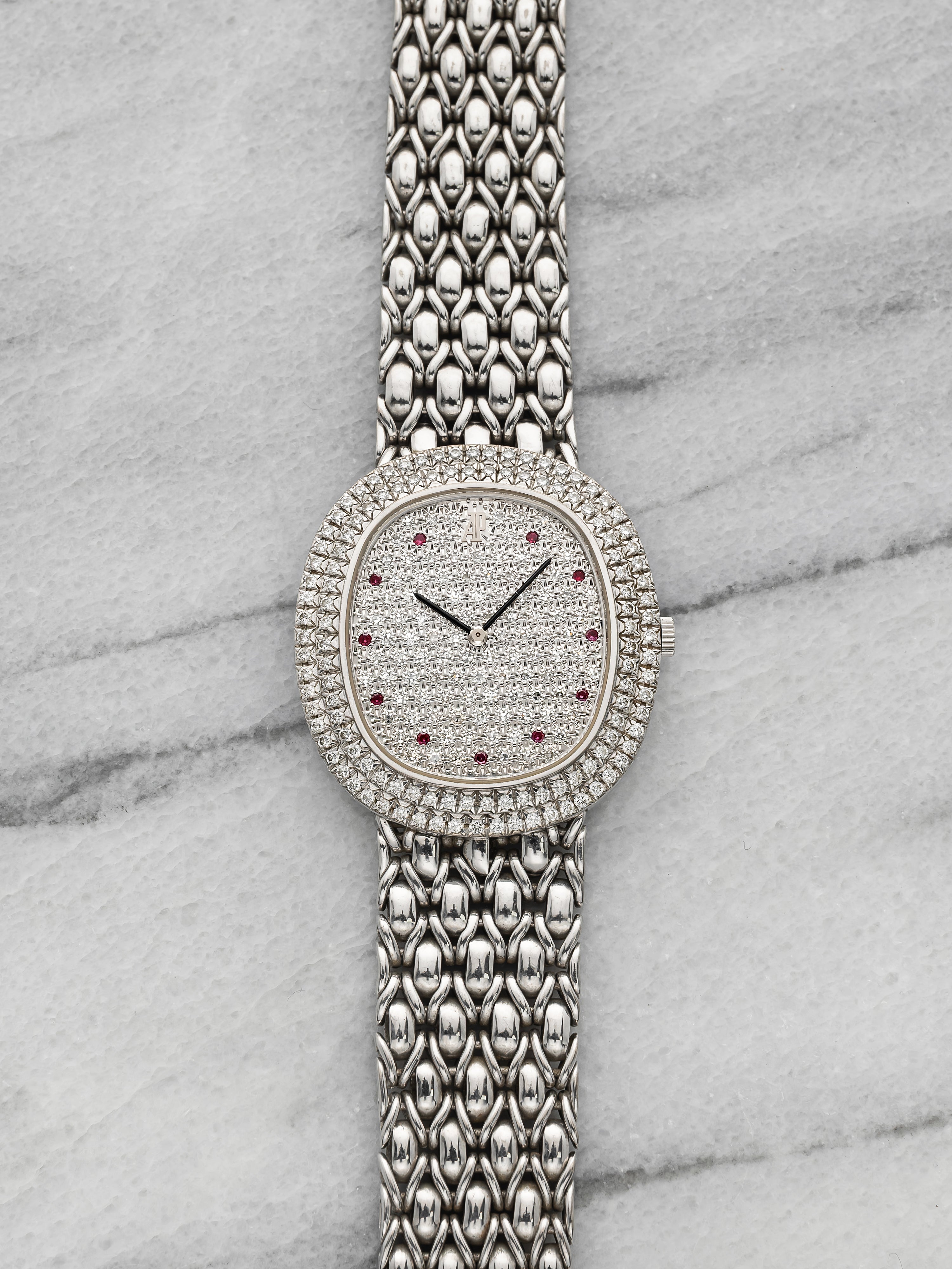 Vintage 1990s Audemars Piguet Dress 56478 18K WG Diamond Ruby Dial Manual 30mm