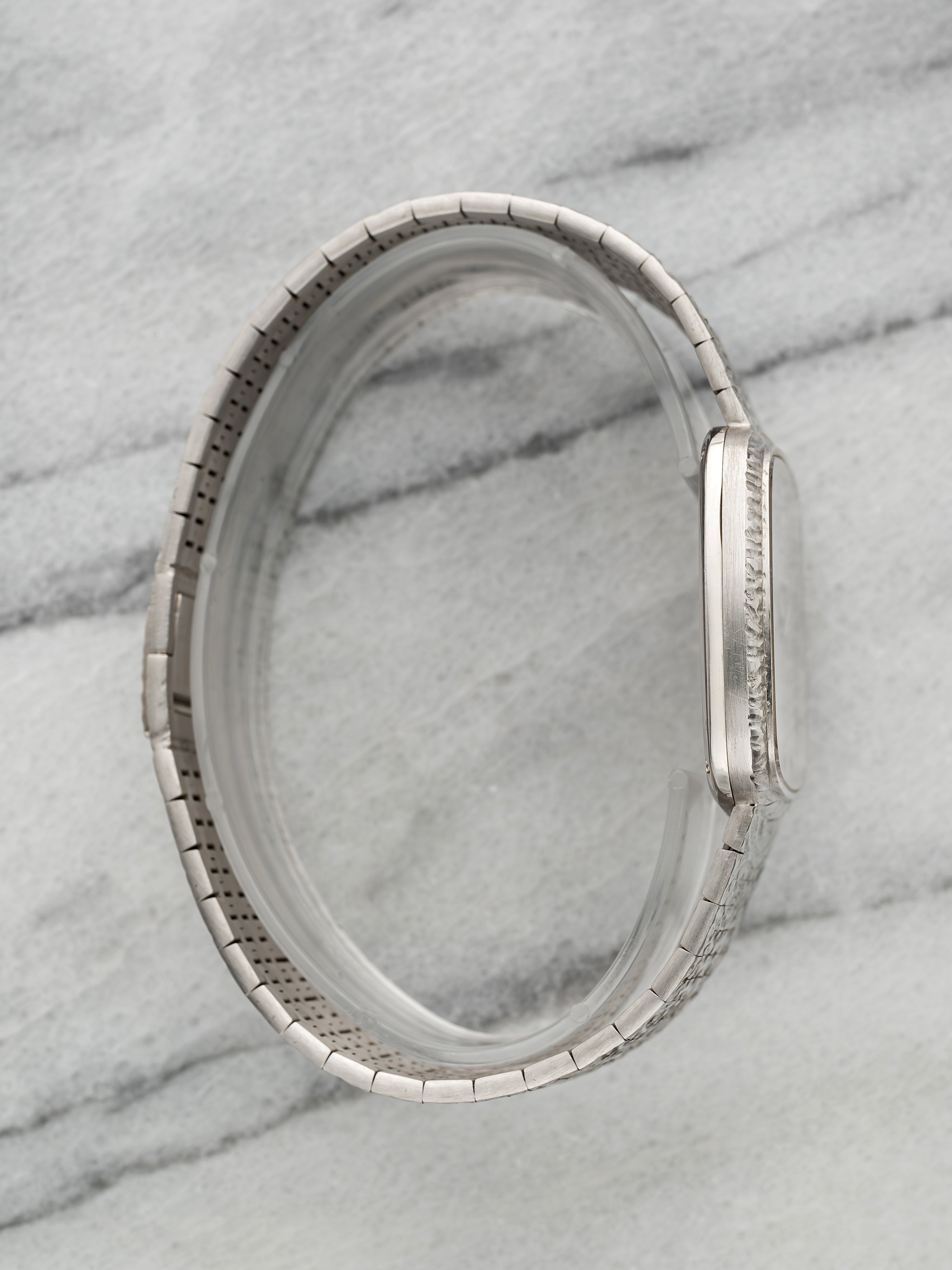 Piaget 12773 A 19 – 18K White Gold Integrated Ruby Indices