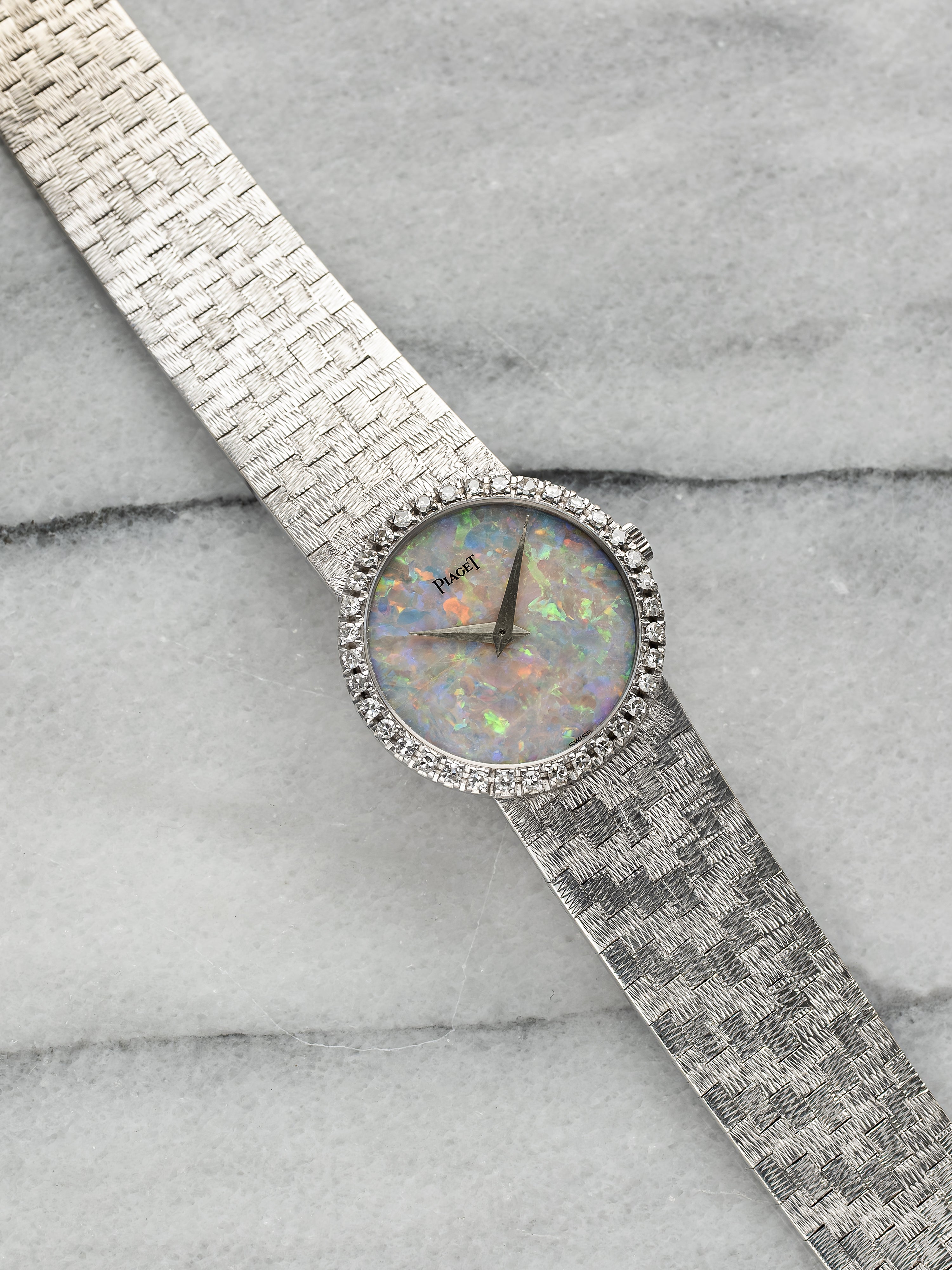 Piaget - Opal & Diamond Bezel.