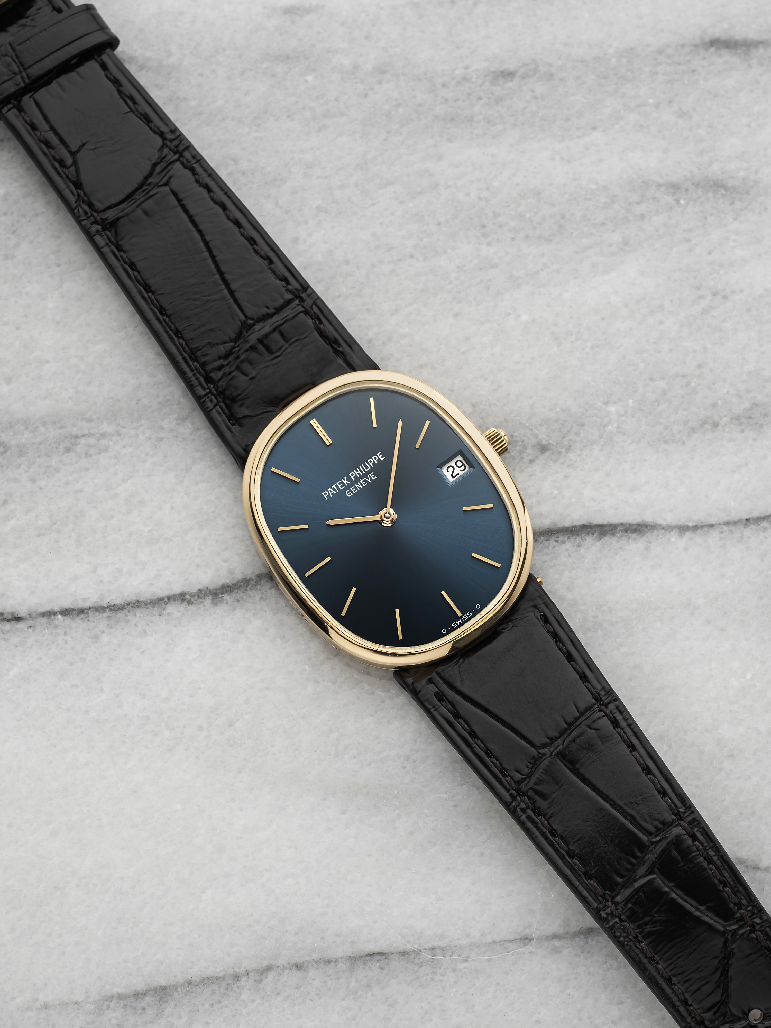 1970s Patek Philippe Ellipse 3548J 18k Yellow Gold Blue Dial Manual 28mm