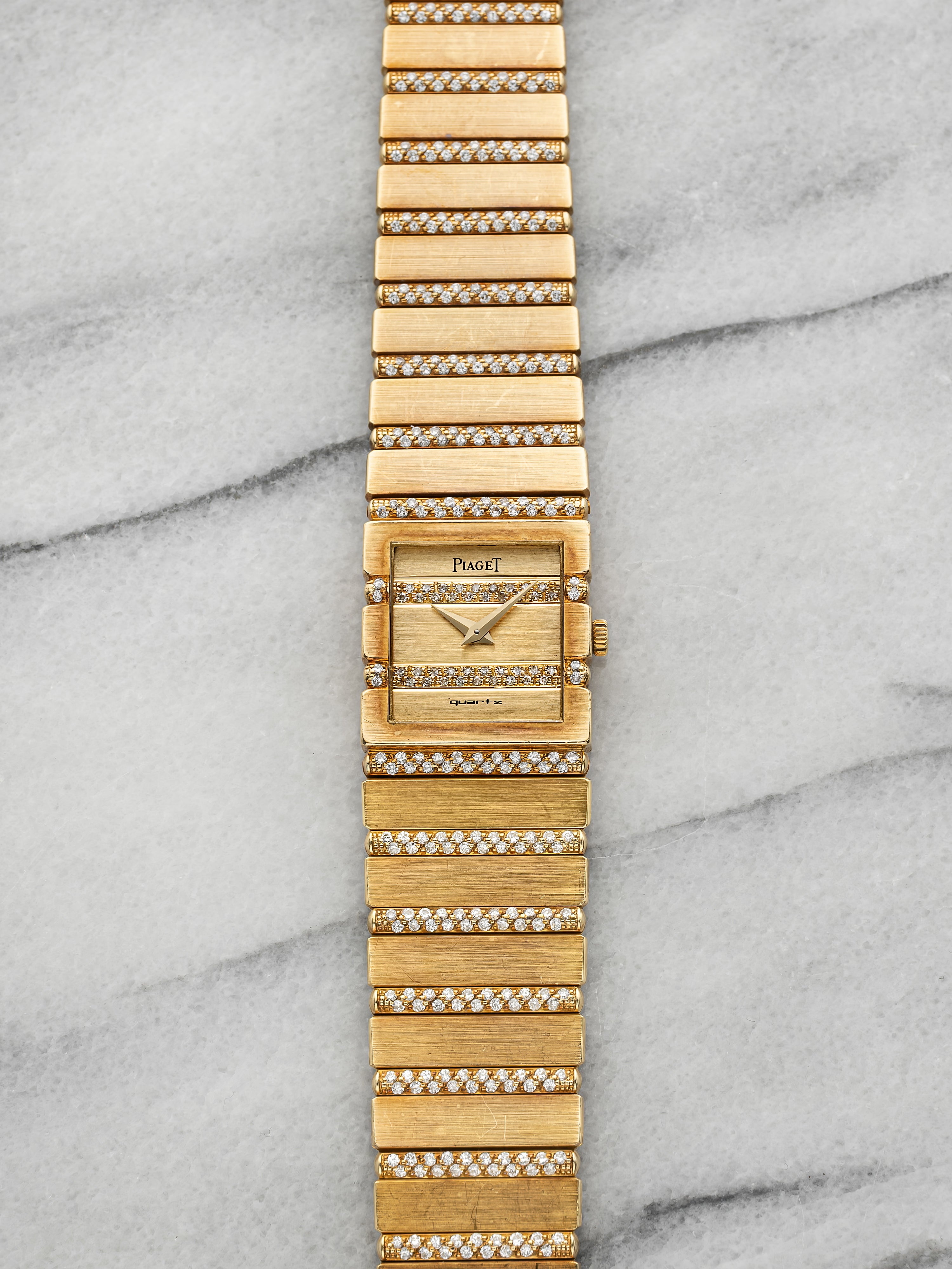 Vintage 1990s Piaget Polo 8131 C705 18K YG Staggered Diamond Dial Quartz 20mm