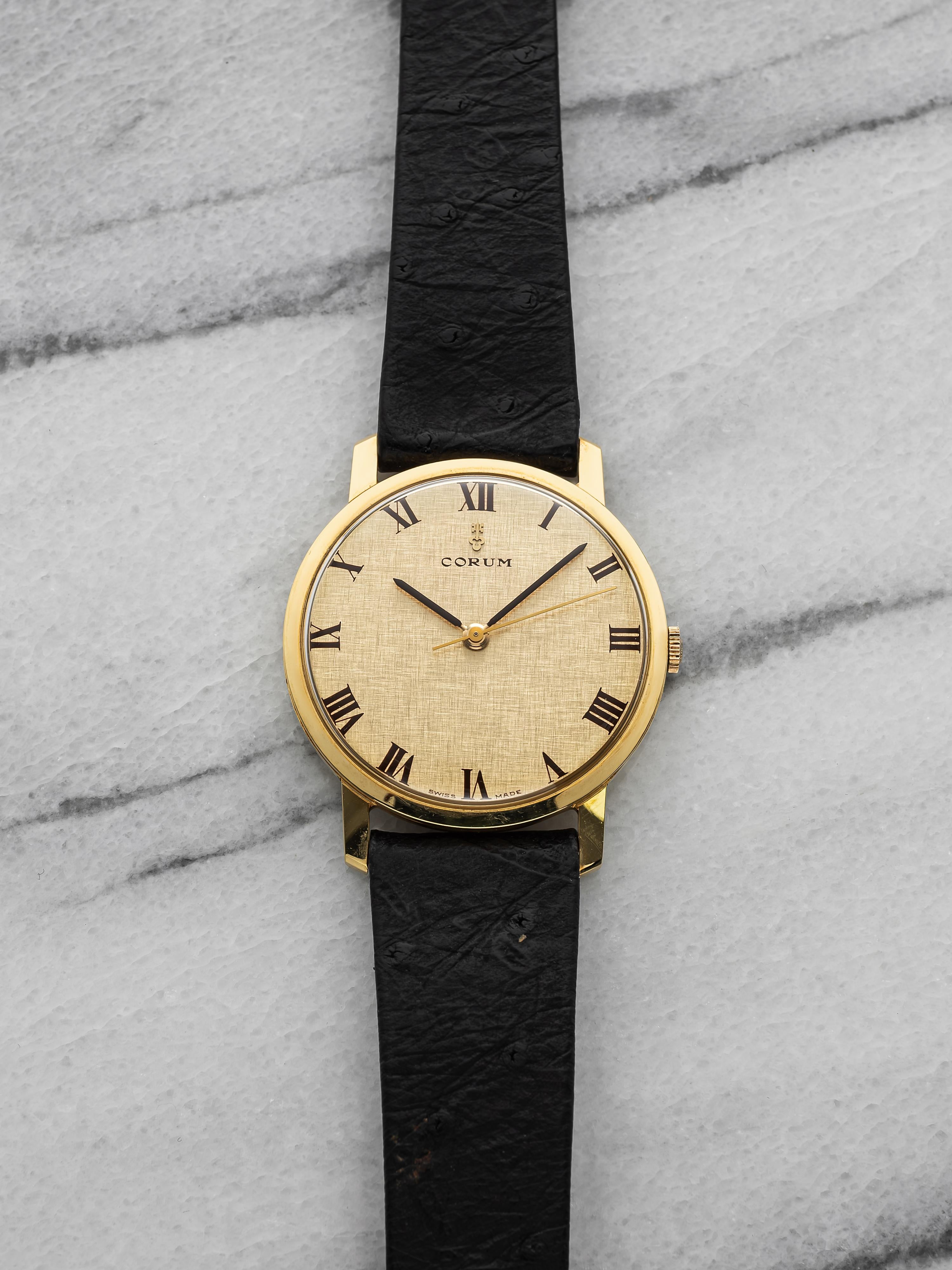 Vintage 1973 Corum 51116 18K YG Manual Champagne Linen 34mm