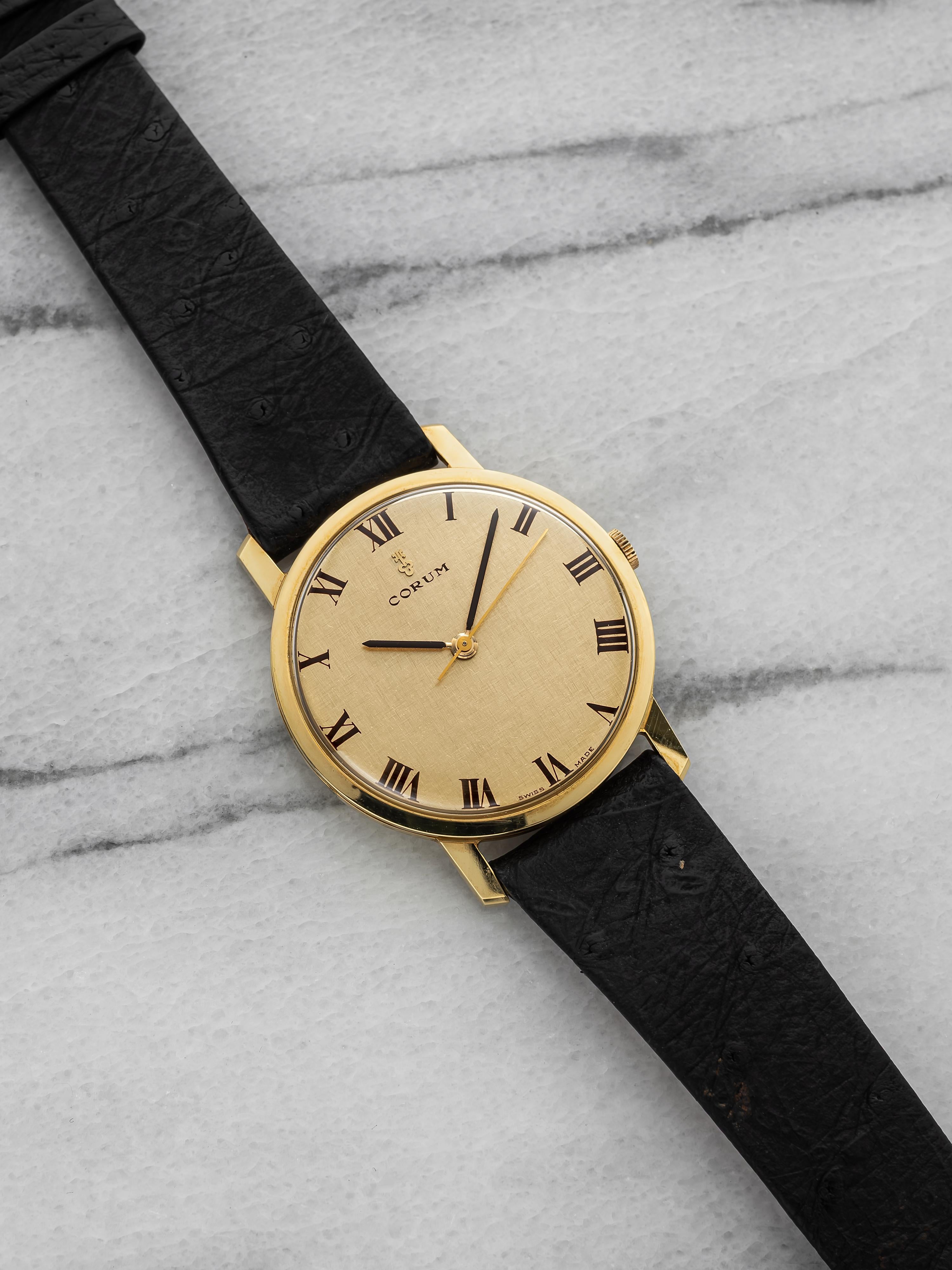 Vintage 1973 Corum 51116 18K YG Manual Champagne Linen 34mm