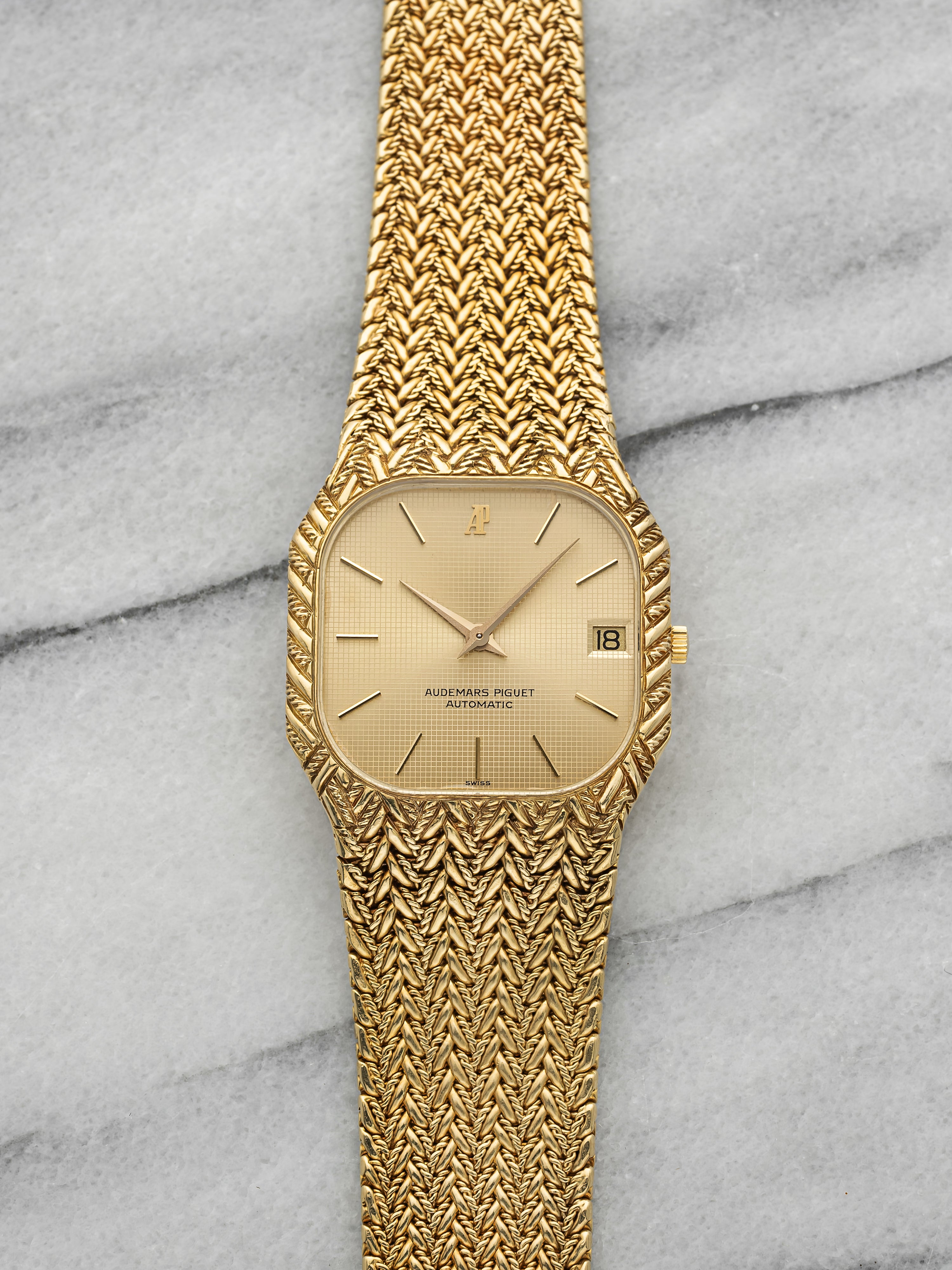 Vintage 1980s Audemars Piguet Integrated 18K YG Champagne Grid Dial Auto 33mm