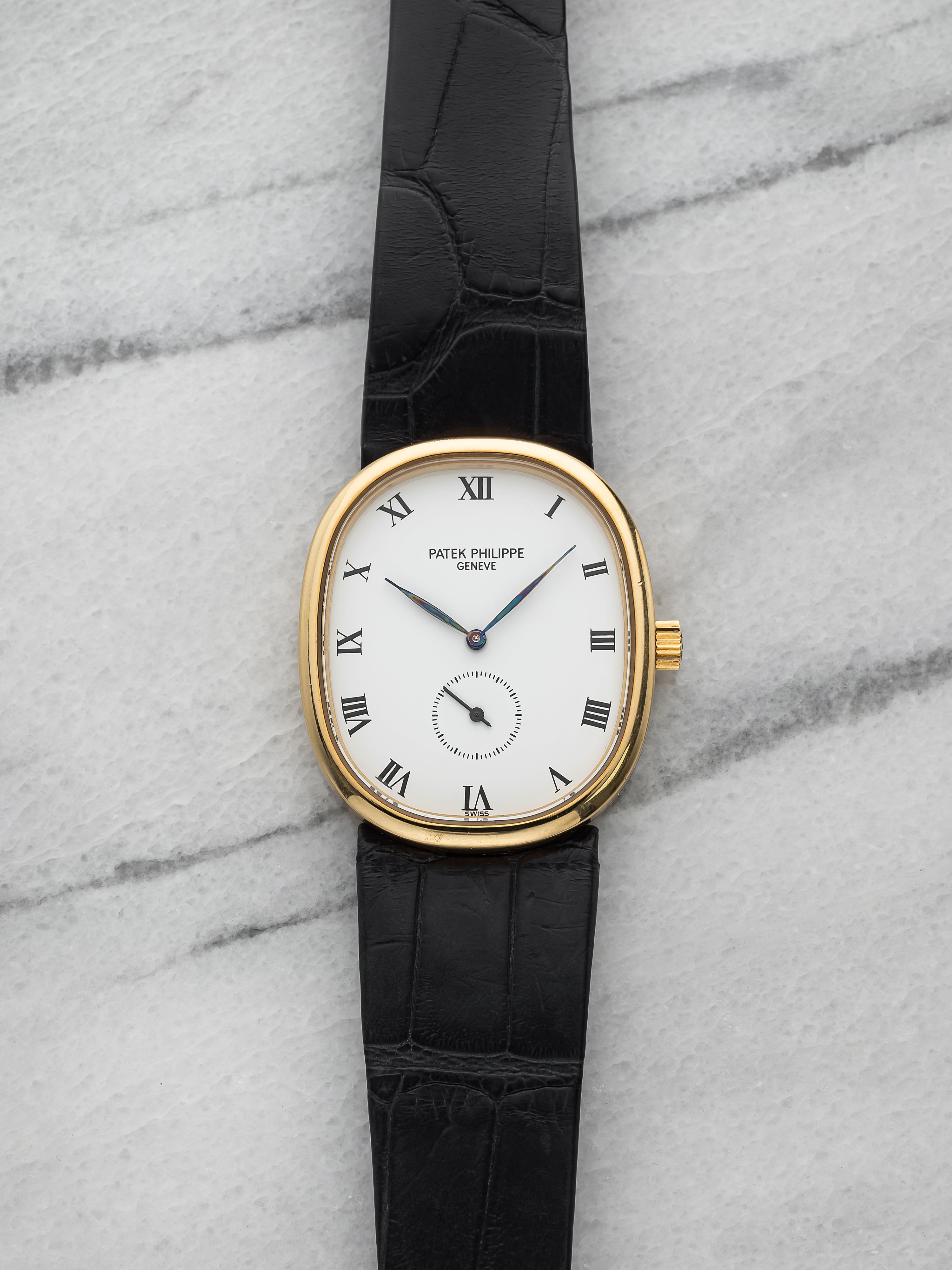 Patek Philippe Ellipse 3948 - 18K Yellow Gold, White Small Seconds Dial