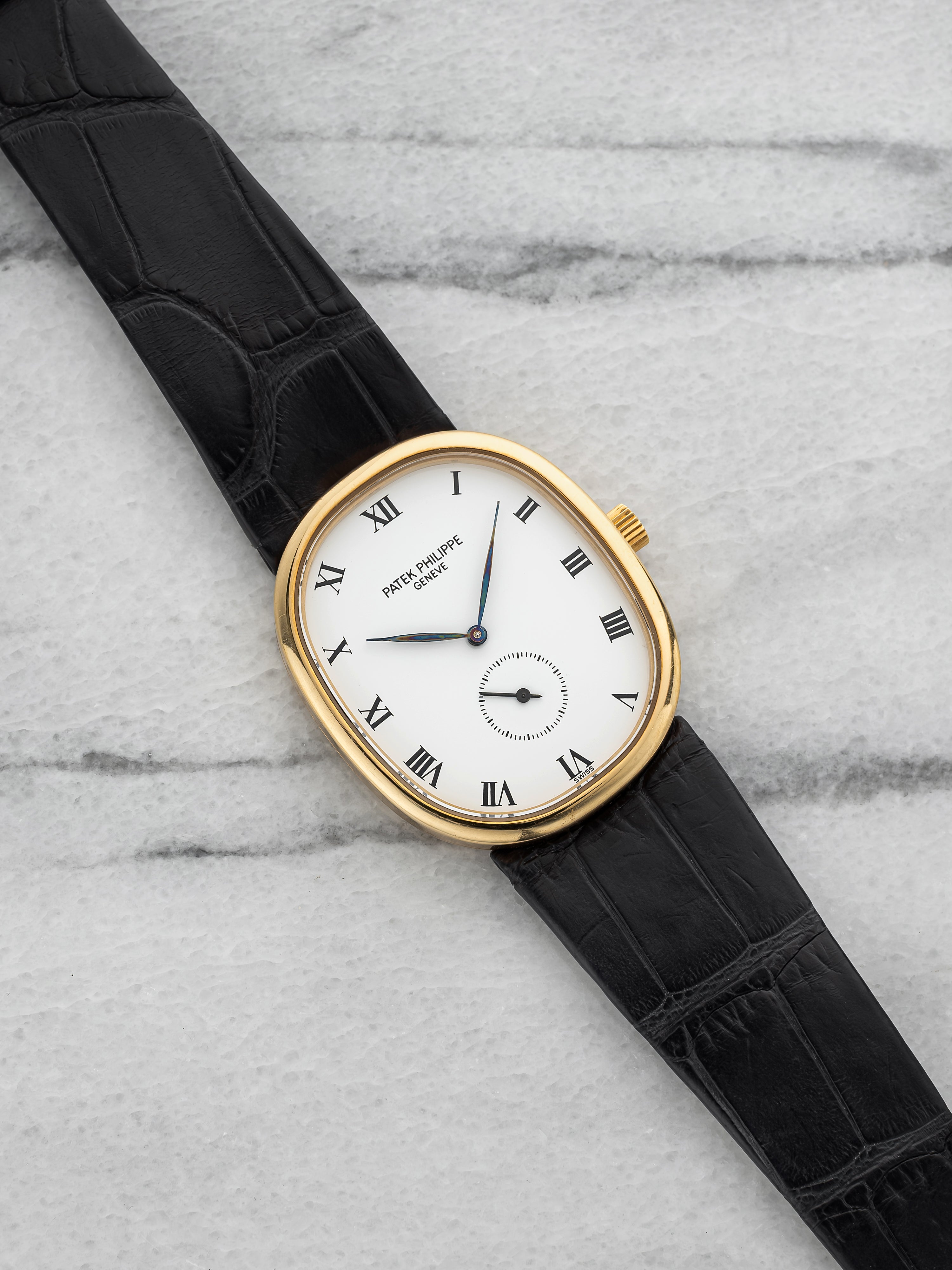 Patek Philippe Ellipse 3948 - 18K Yellow Gold, White Small Seconds Dial