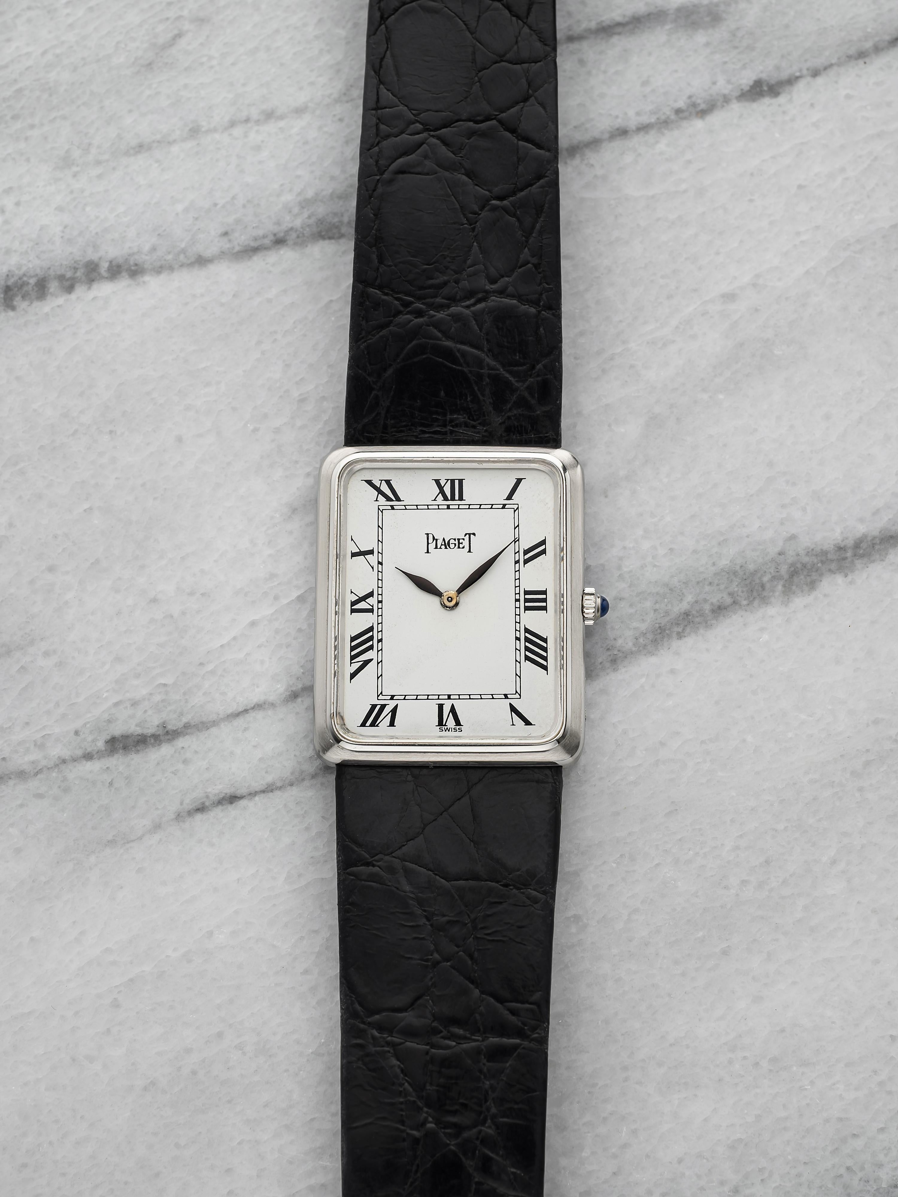 Vintage 1970s Piaget Tank 9297 18K WG Manual White Roman Dial 24mm