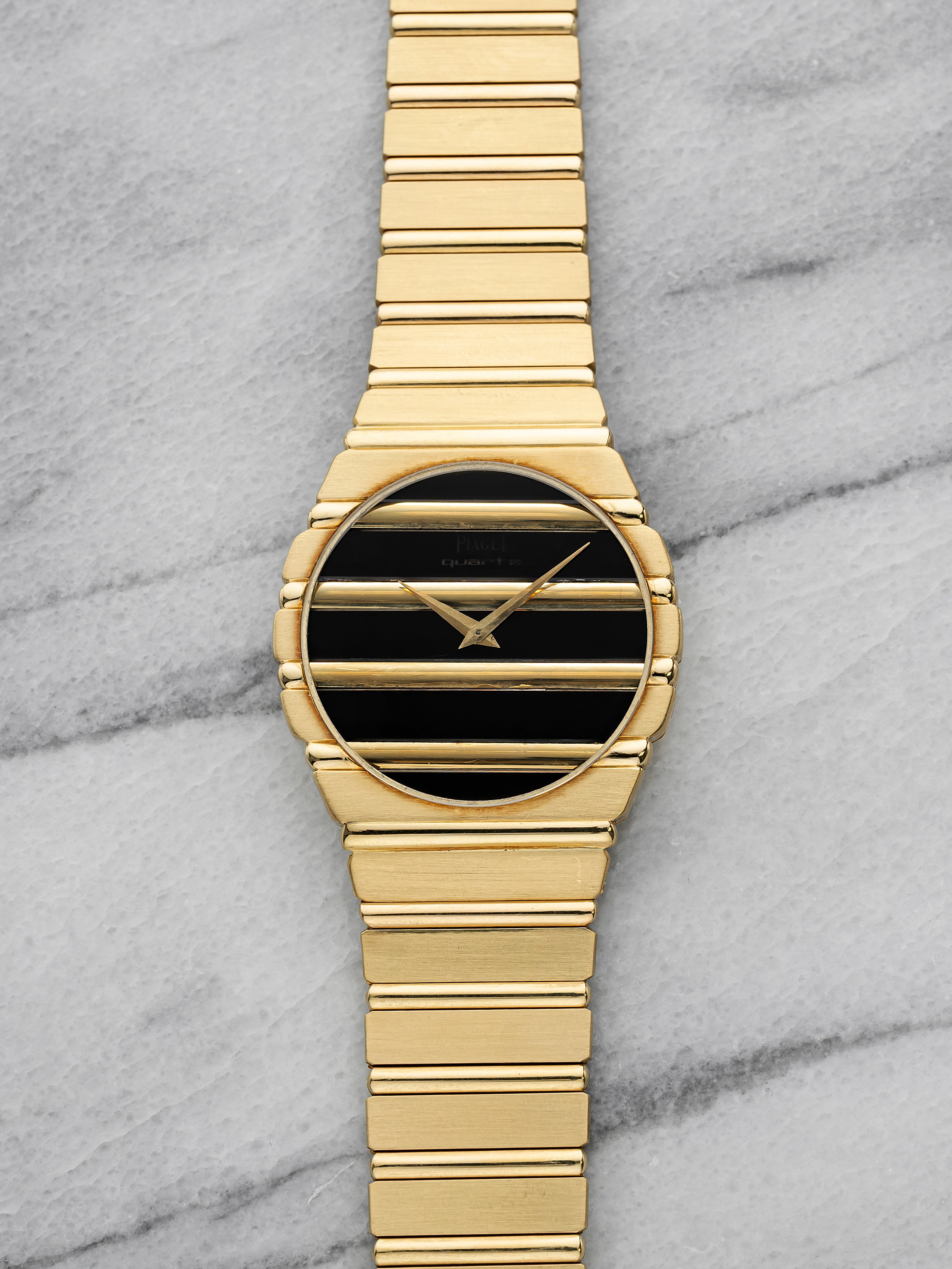 Piaget Polo 7661 C 701 - 18K Yellow Gold & Onyx