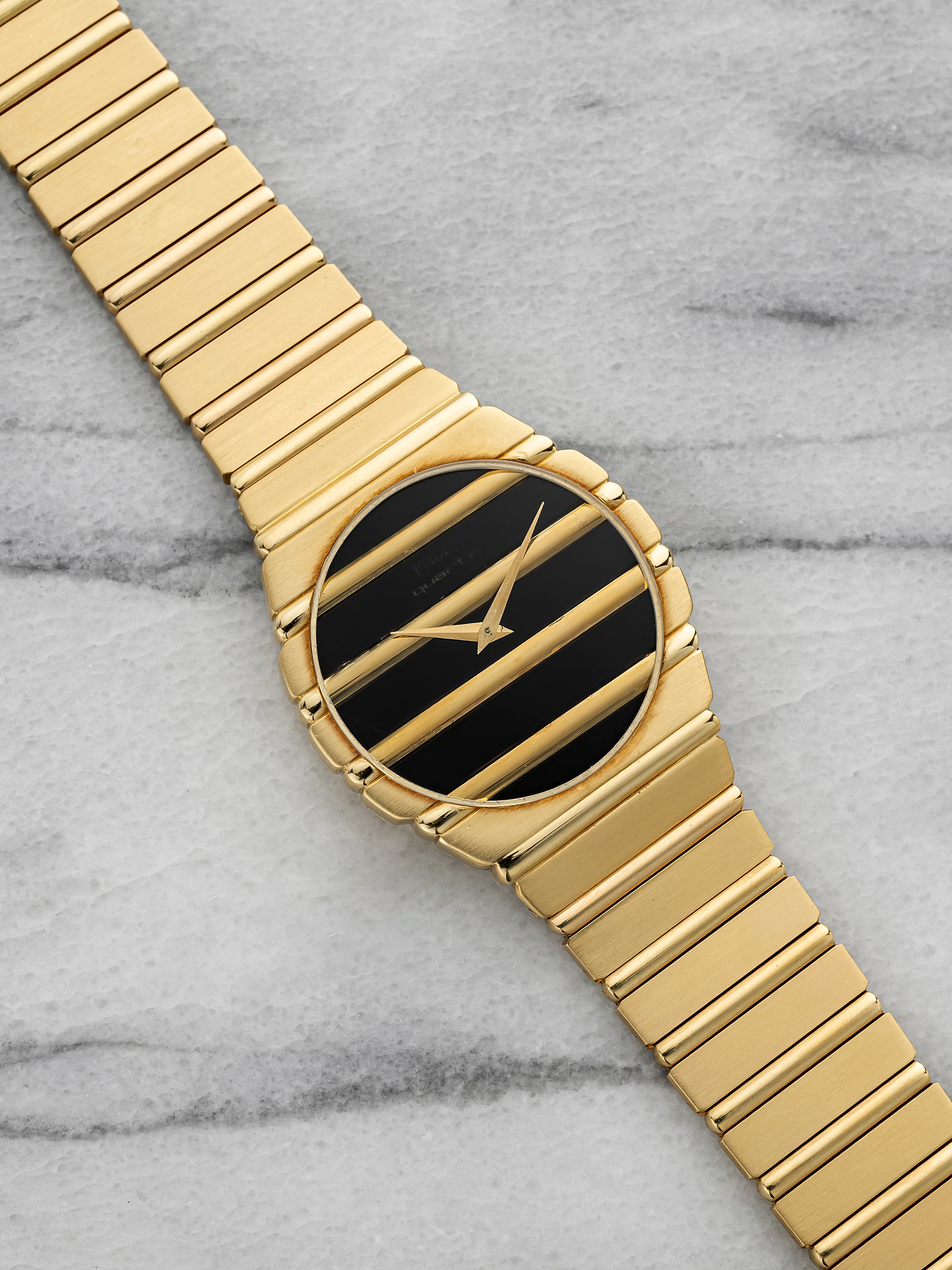 Piaget Polo 7661 C 701 - 18K Yellow Gold & Onyx