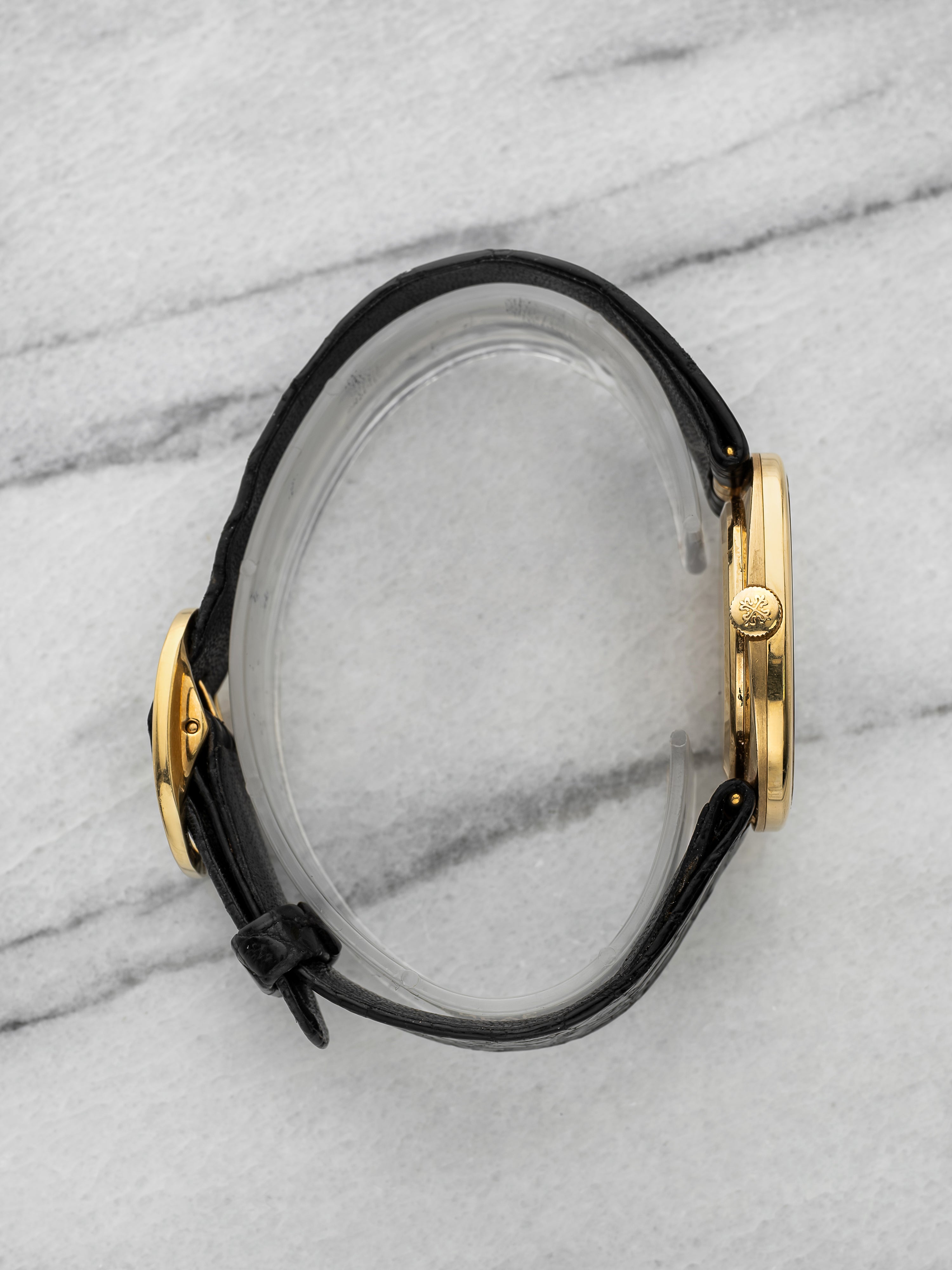 Patek Philippe Ellipse 3848J - 18K Yellow Gold Blue sunburst dial