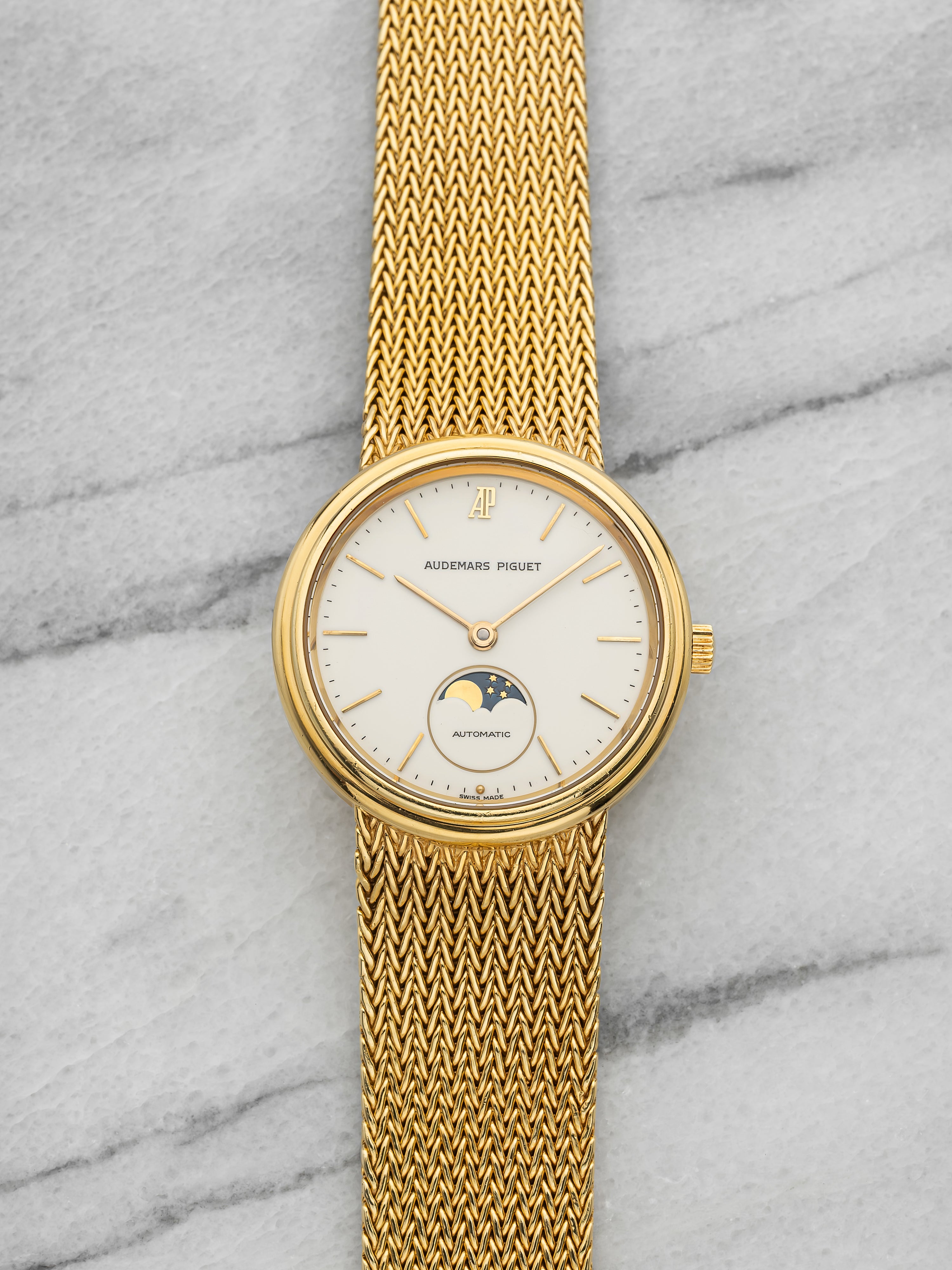1980s Audemars Piguet Ultra Thin Moonphase 18K YG White Dial Auto 33 mm