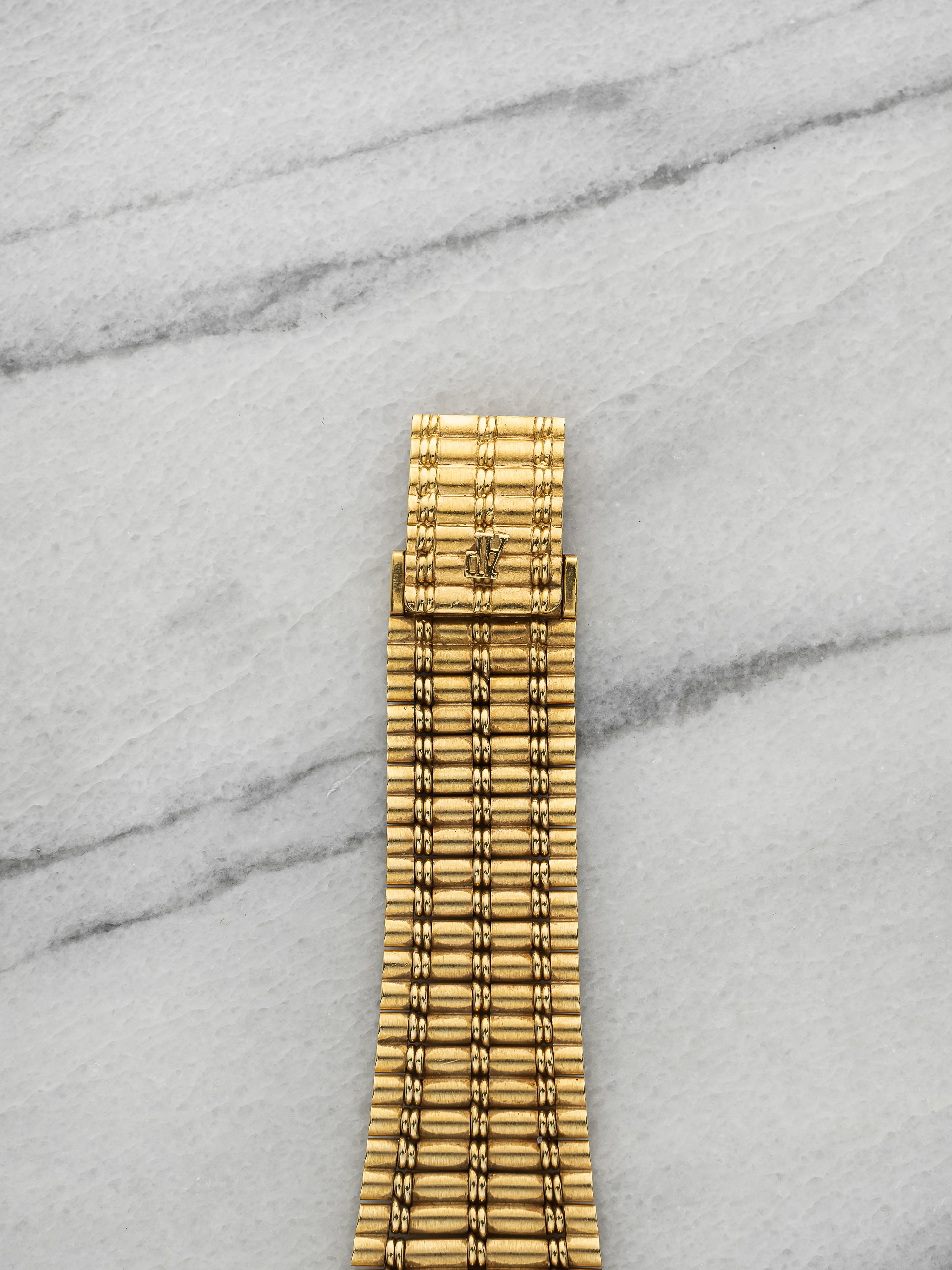 Vintage 1980s Audemars Piguet Bamboo 56205 18K YG Champagne Dot Dial Quartz 27mm