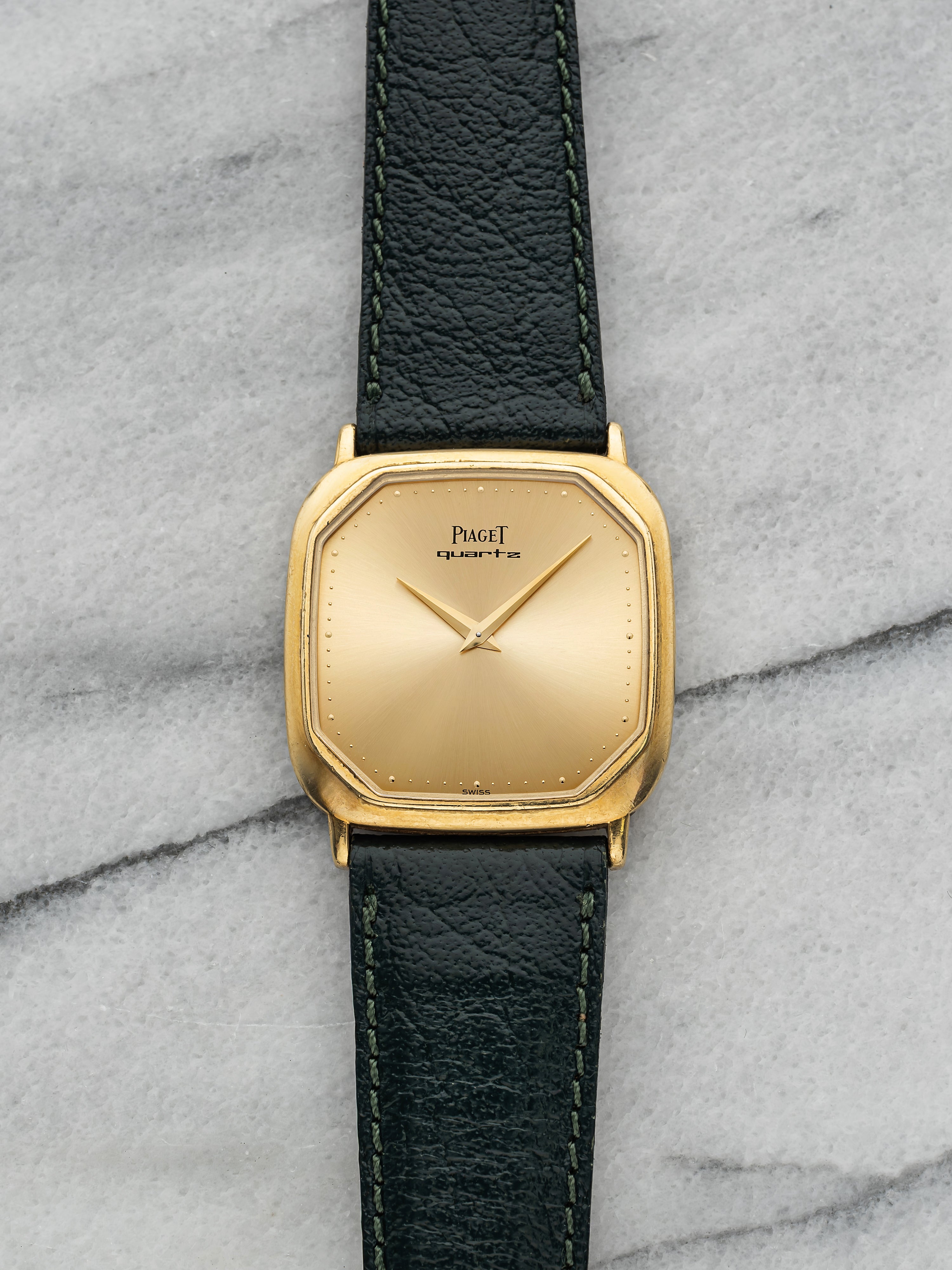 Piaget Polo 7702 – 18k Yellow Gold, Champagne Sunburst Dial
