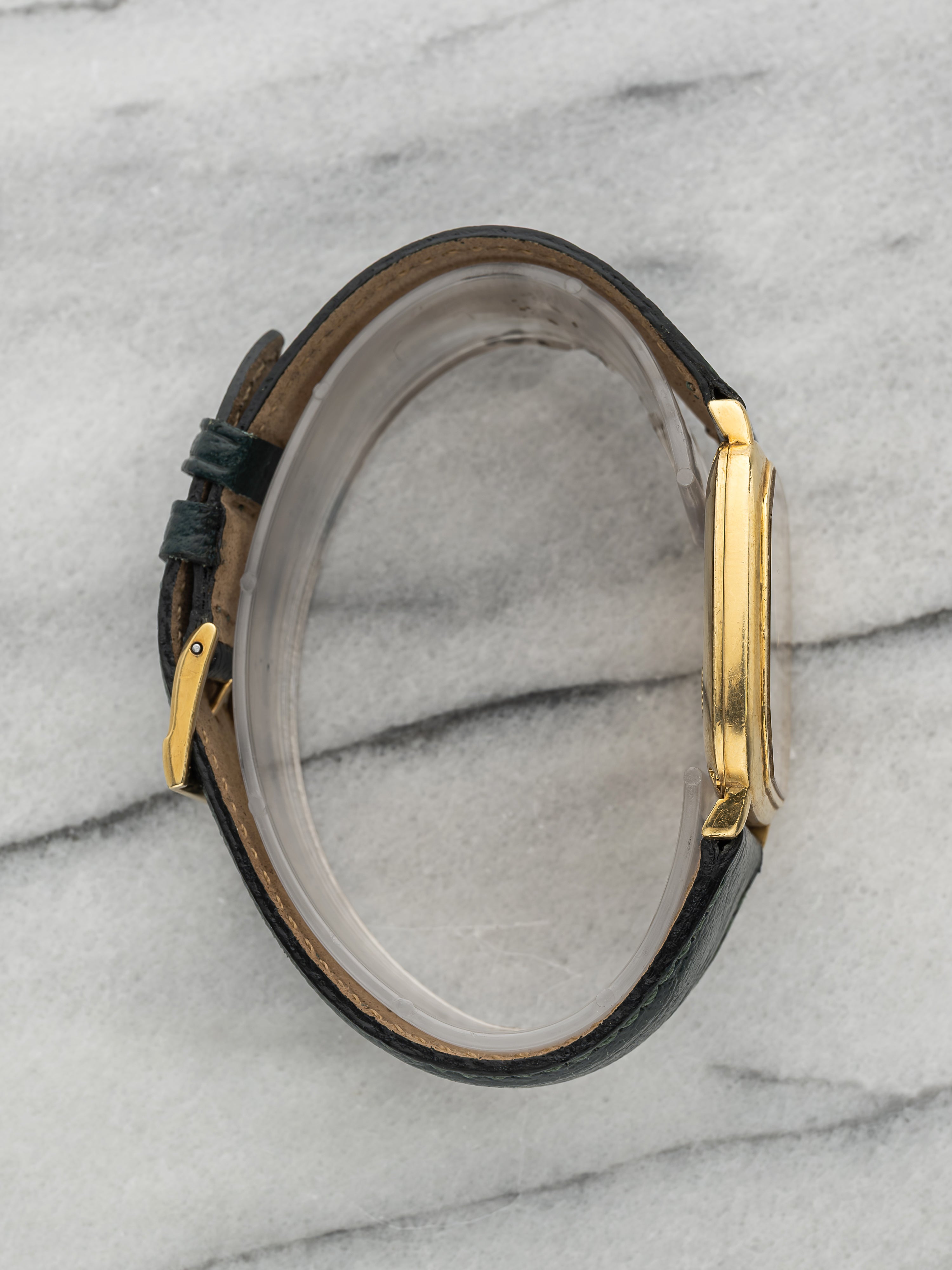 Piaget Polo 7702 – 18k Yellow Gold, Champagne Sunburst Dial