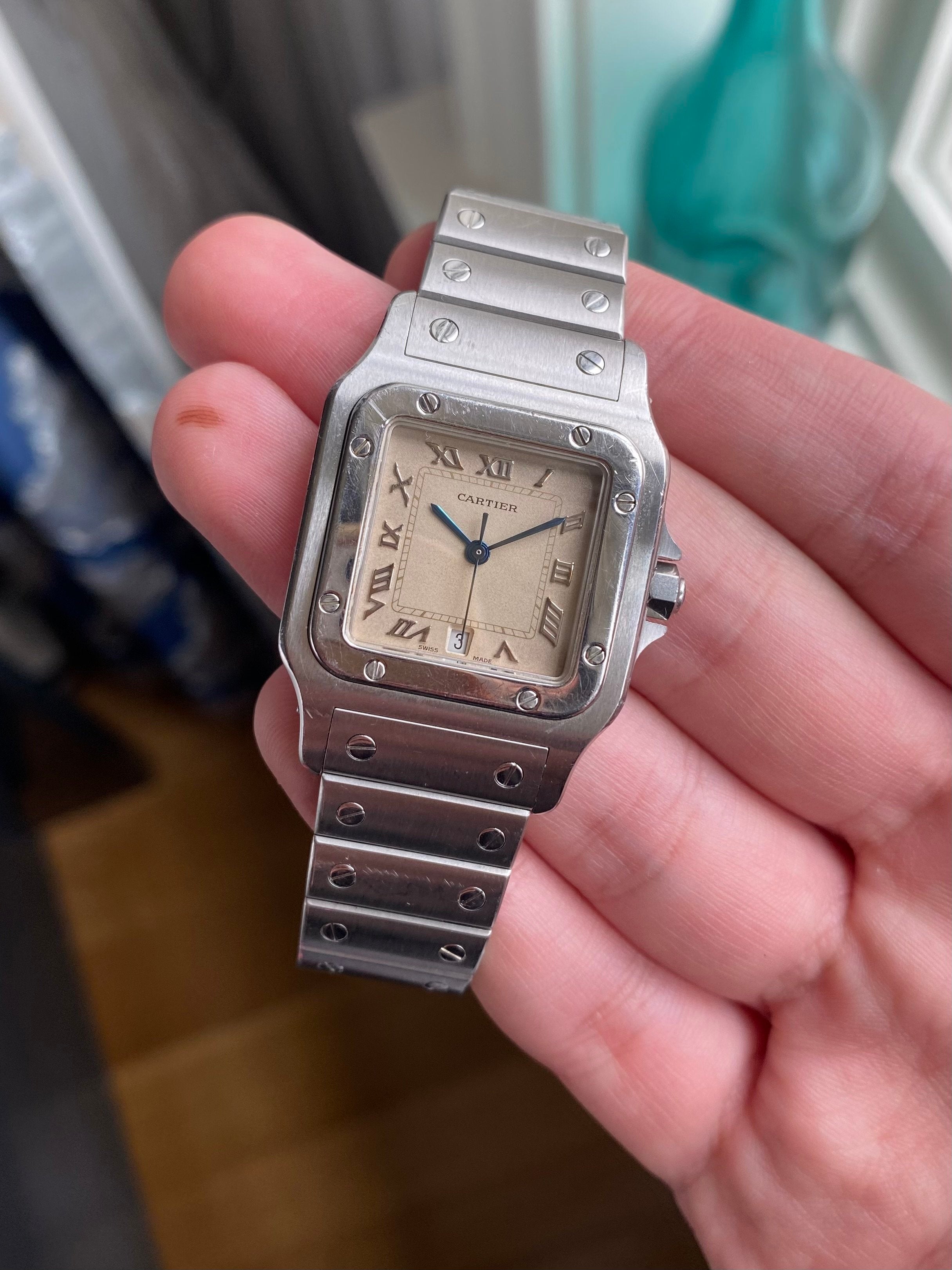 Cartier Santos 1564 - Cream Roman numerals.